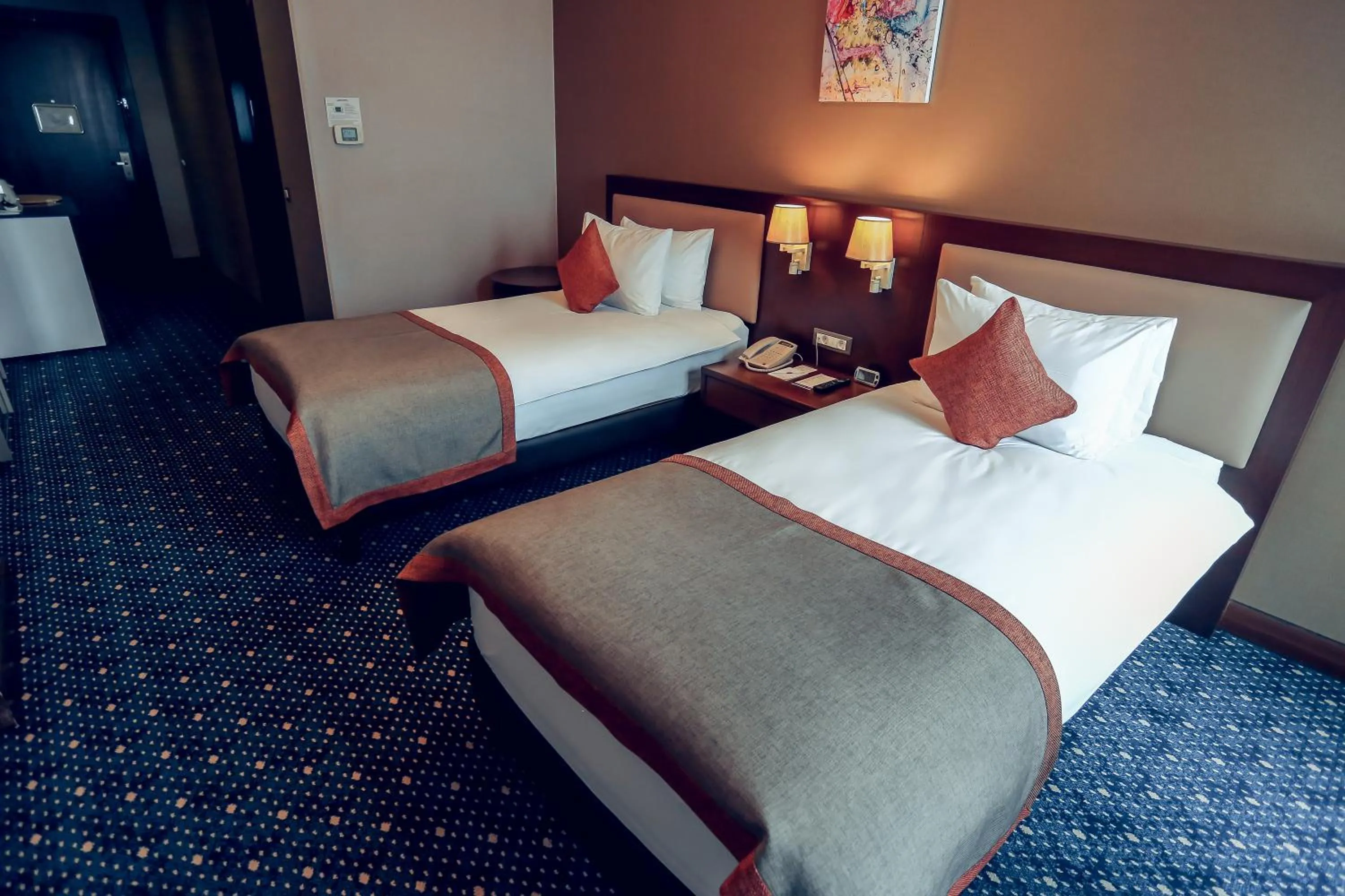 Bed in Parkside Hotel & Apartments