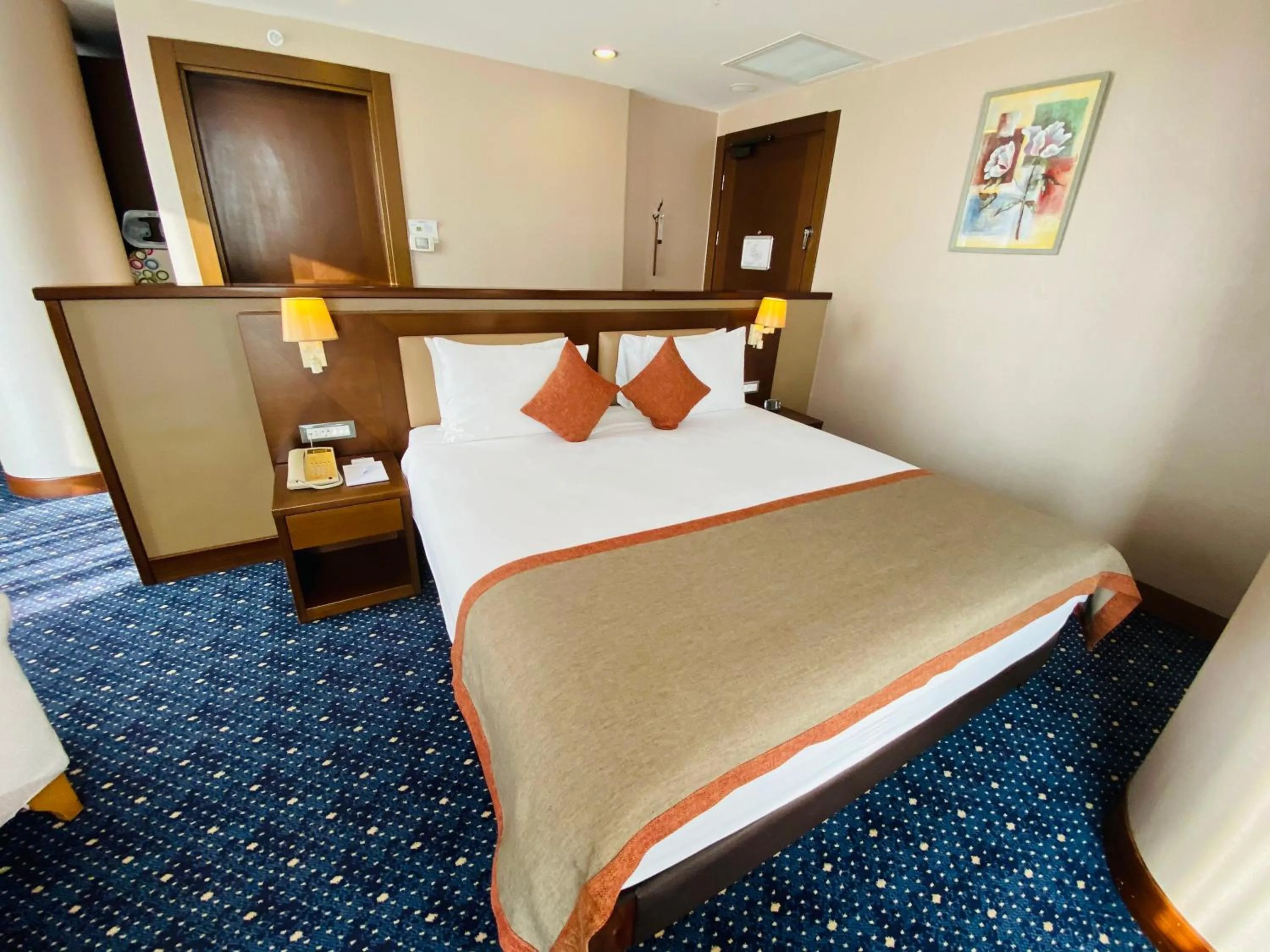 Bed in Parkside Hotel & Apartments