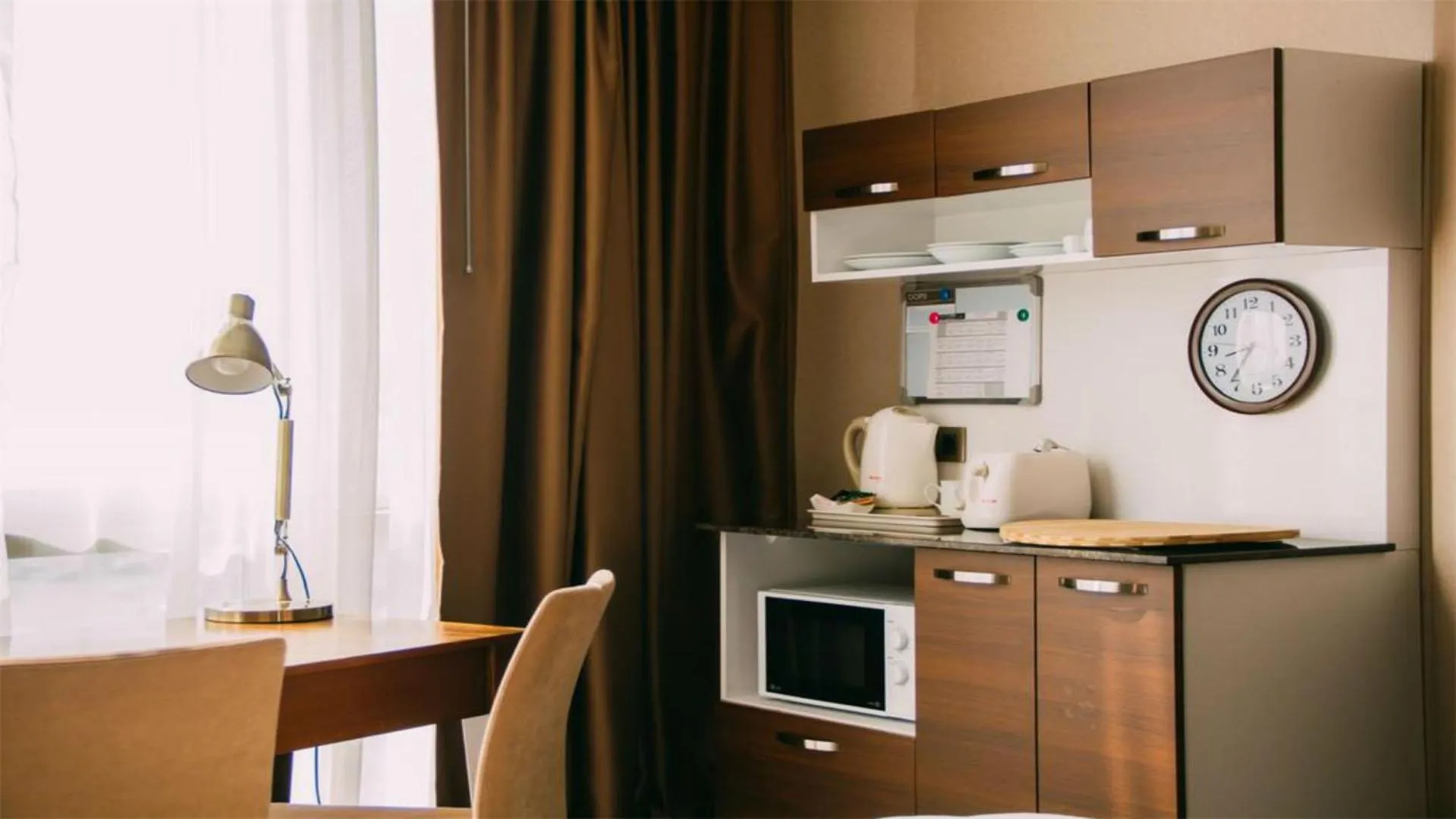 Kitchen or kitchenette in Parkside Hotel & Apartments