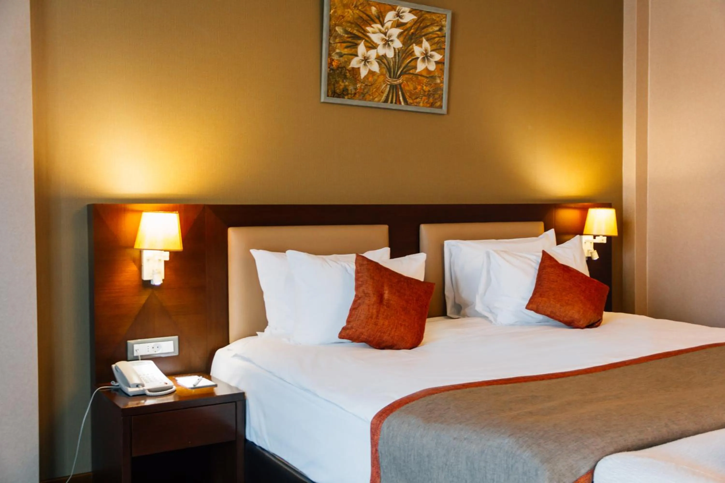 Bed in Parkside Hotel & Apartments