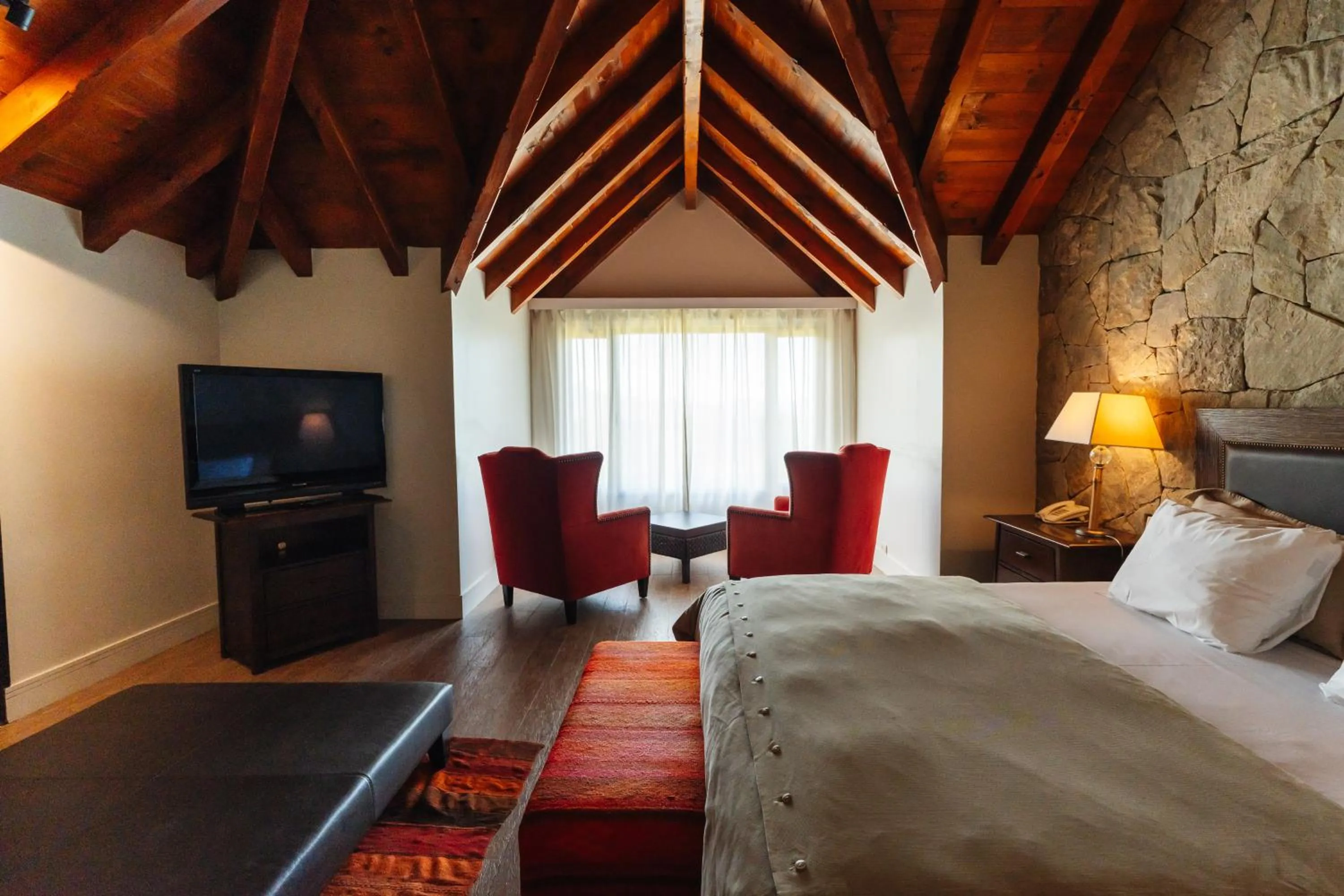 Bed in Loi Suites Chapelco Hotel