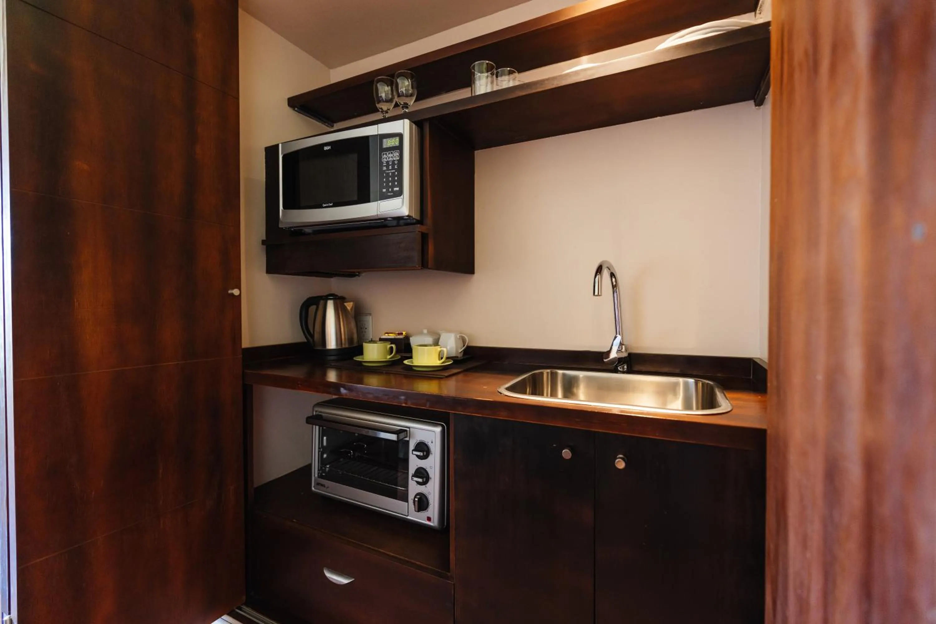 Kitchen or kitchenette in Loi Suites Chapelco Hotel