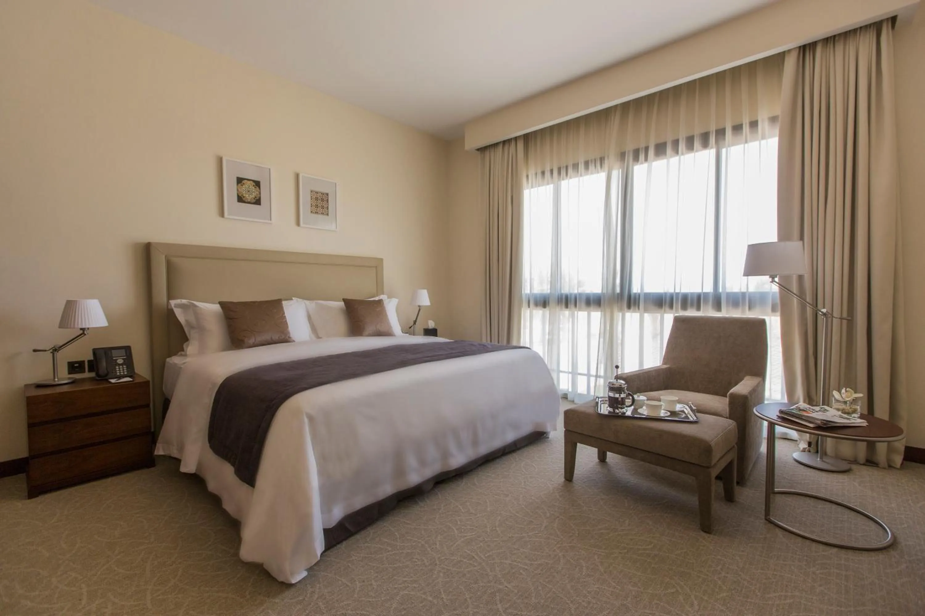 Photo of the whole room, Bed in InterContinental Hotels Doha Residences