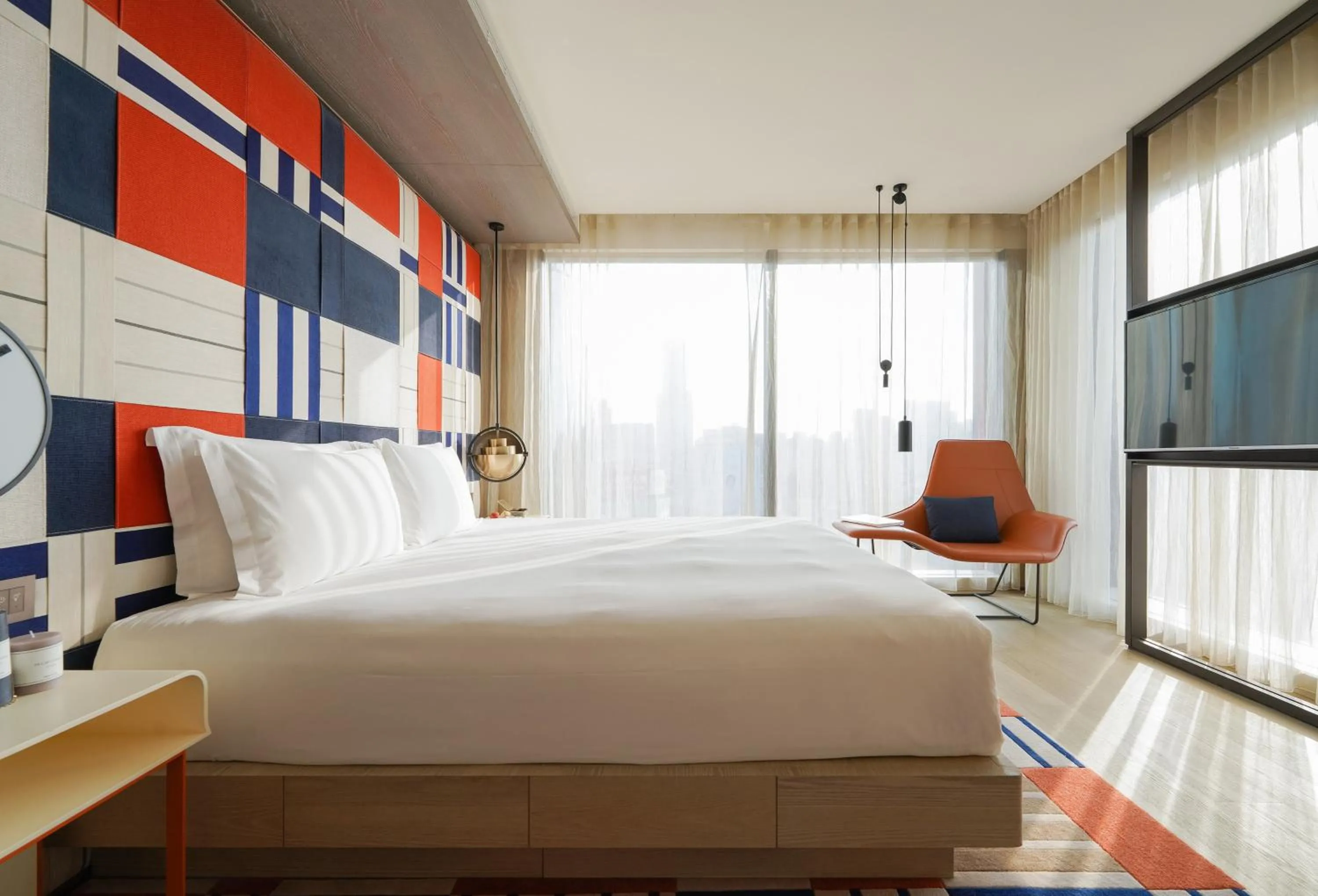 Photo of the whole room, Bed in Hotel Indigo Kaohsiung Central Park by IHG