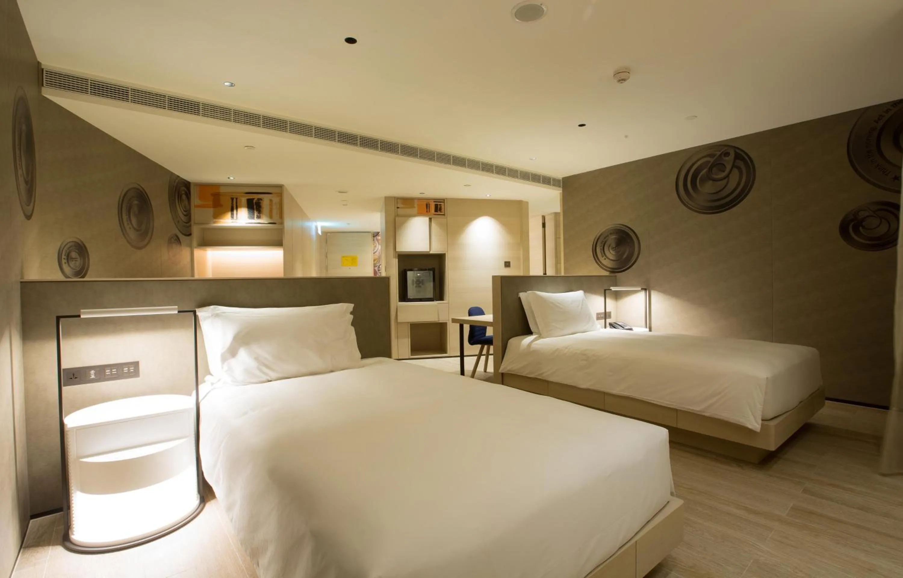 Photo of the whole room, Bed in Hotel Indigo Kaohsiung Central Park by IHG