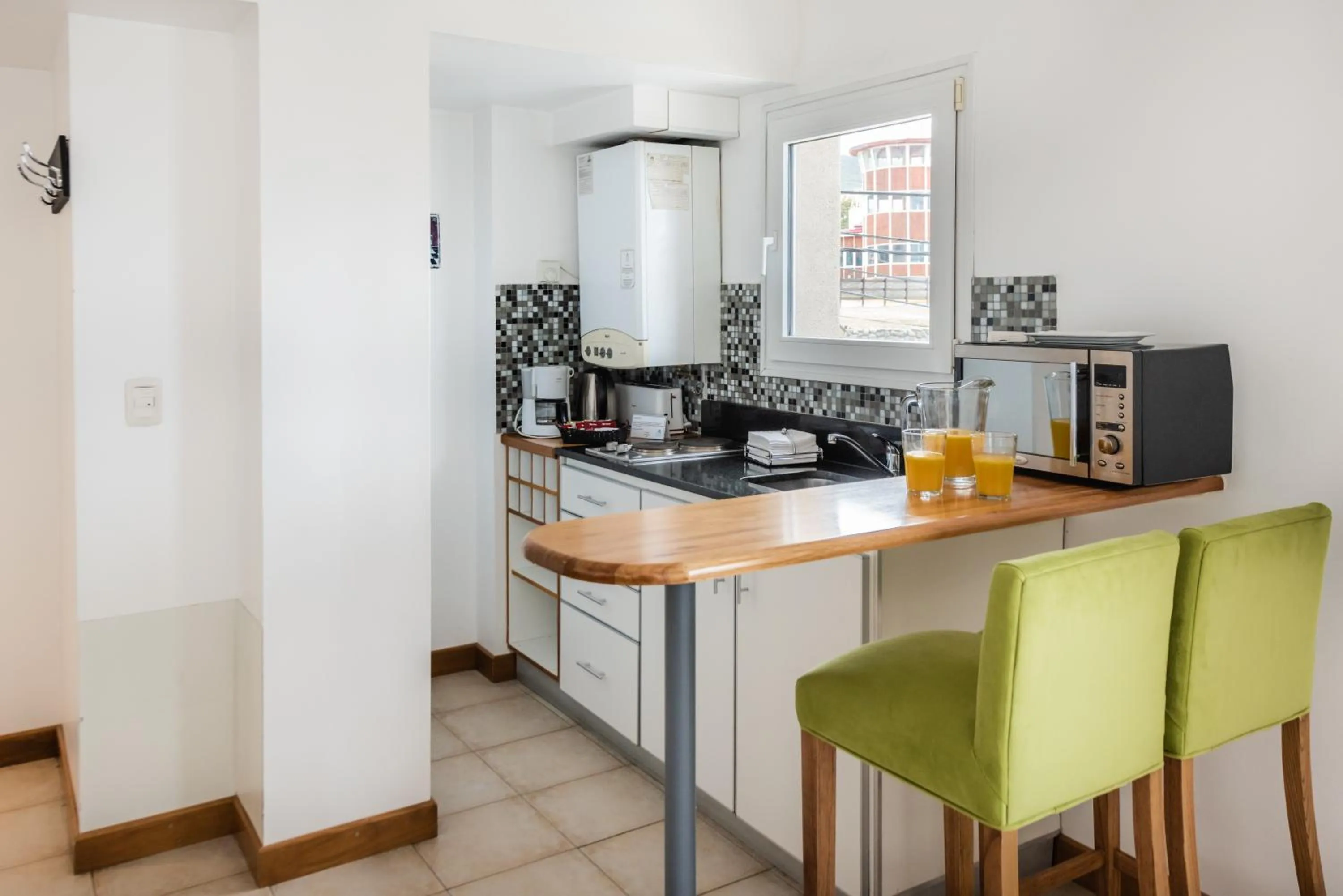 Kitchen or kitchenette in Cilene del Faro Suites & Spa
