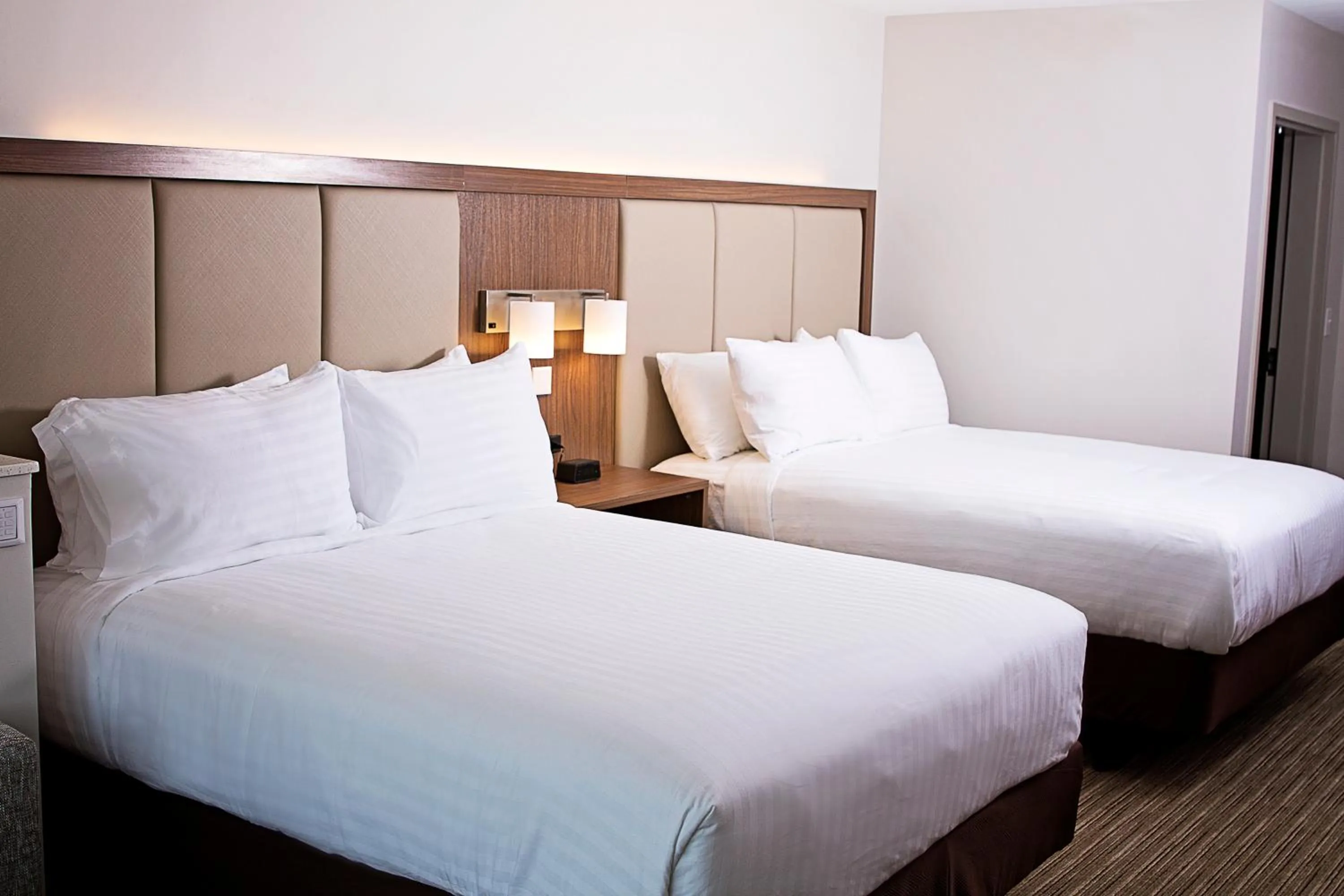 Bed in Holiday Inn Express & Suites Greenwood Mall by IHG