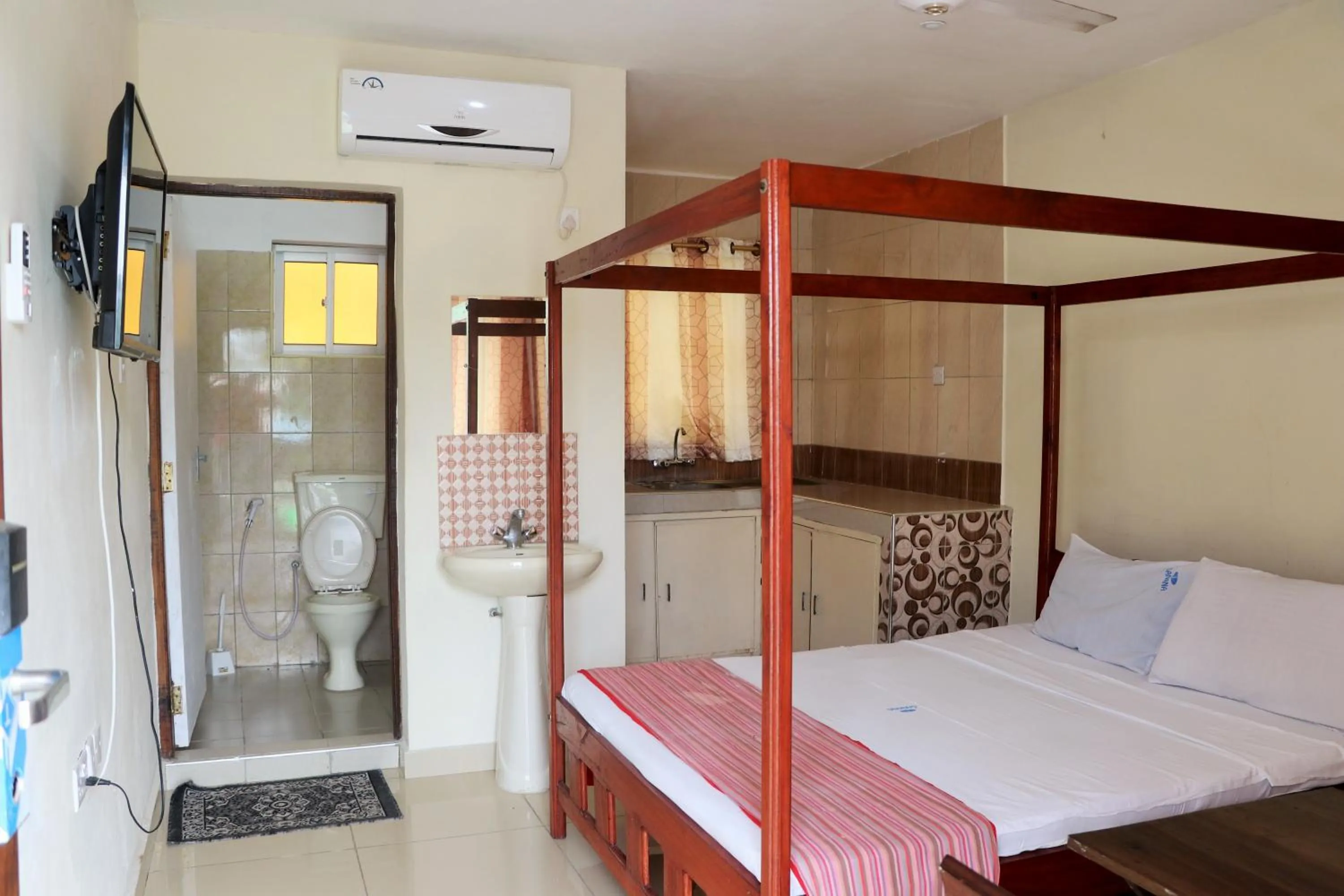 Bed in Sanana Conference Center and Holiday Resort