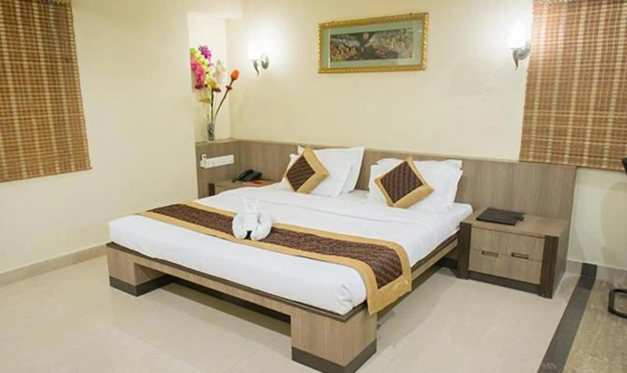 Bed in Vora Corporate Inn