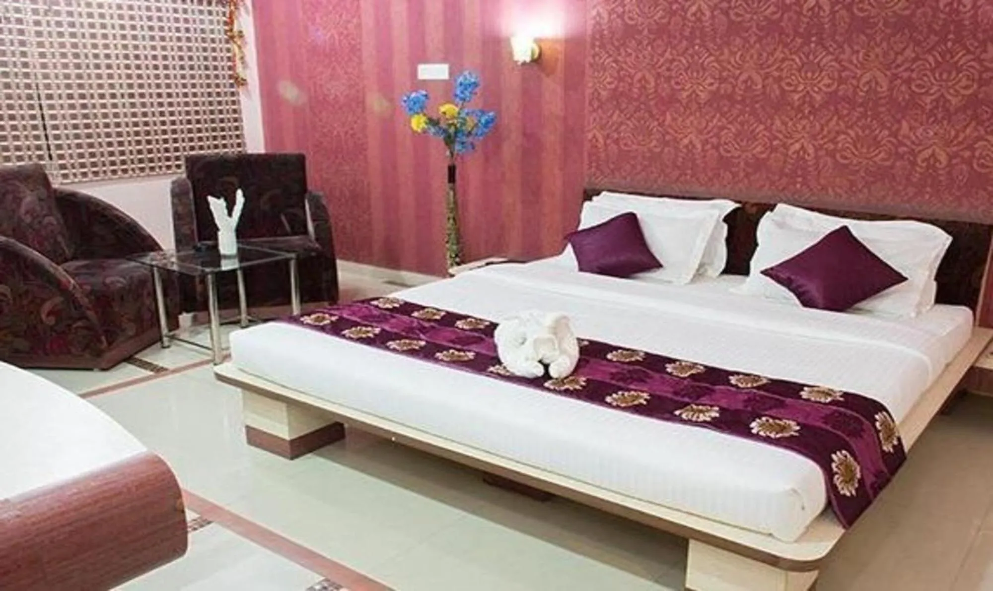 Bed in Vora Corporate Inn