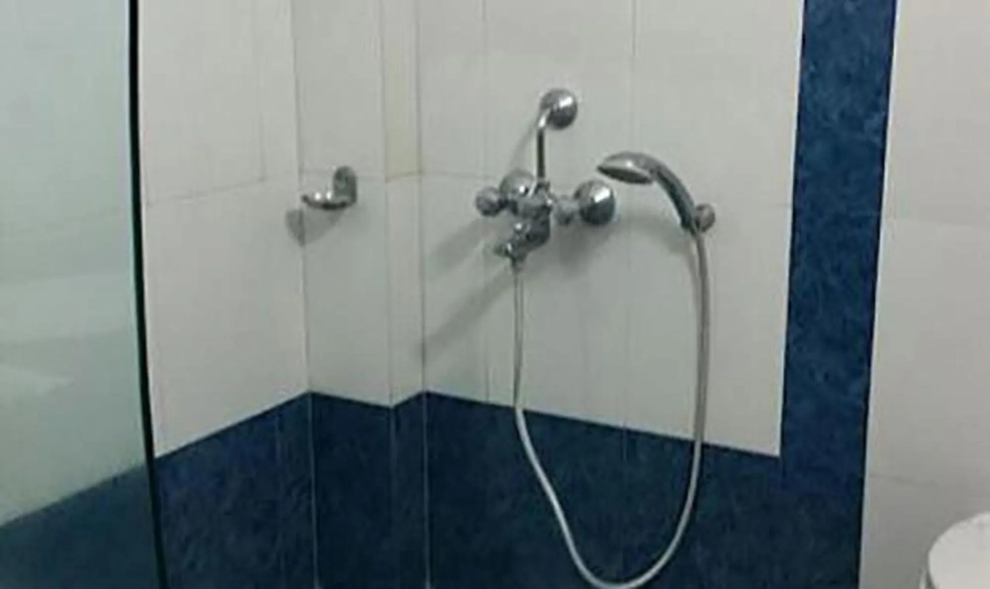 Bathroom in Vora Corporate Inn