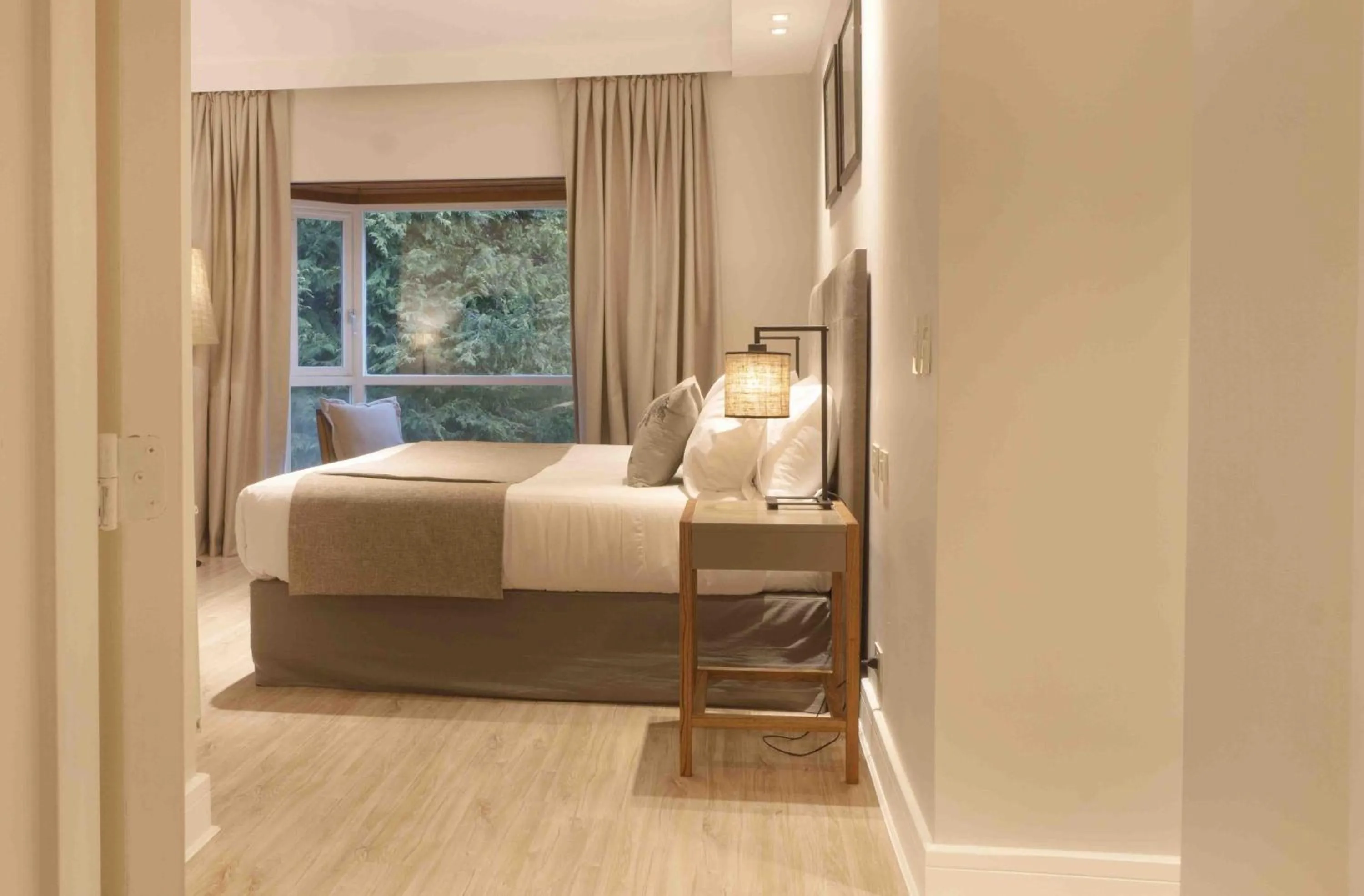 Bed in La Cascada Casa Patagónica by DON