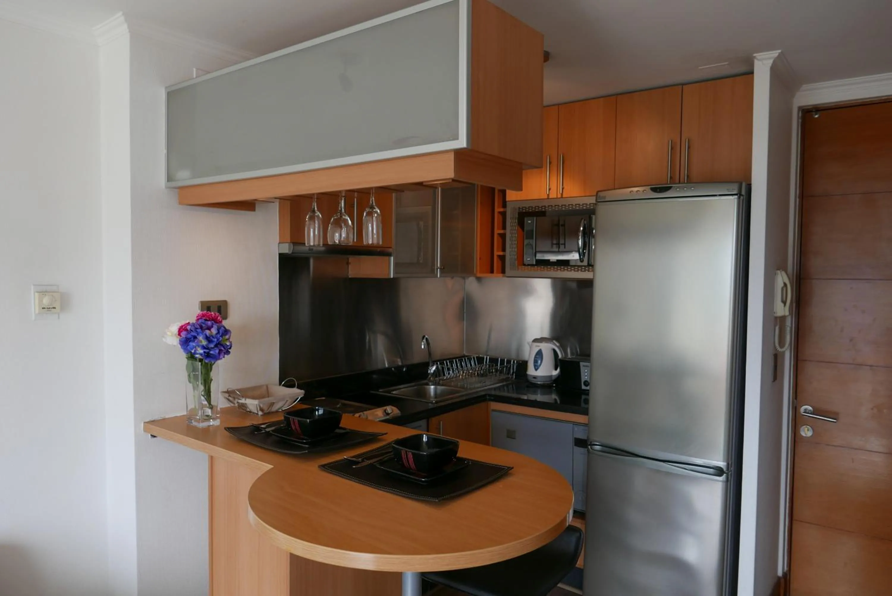 Kitchen or kitchenette in Apartamentos Cordova Savini