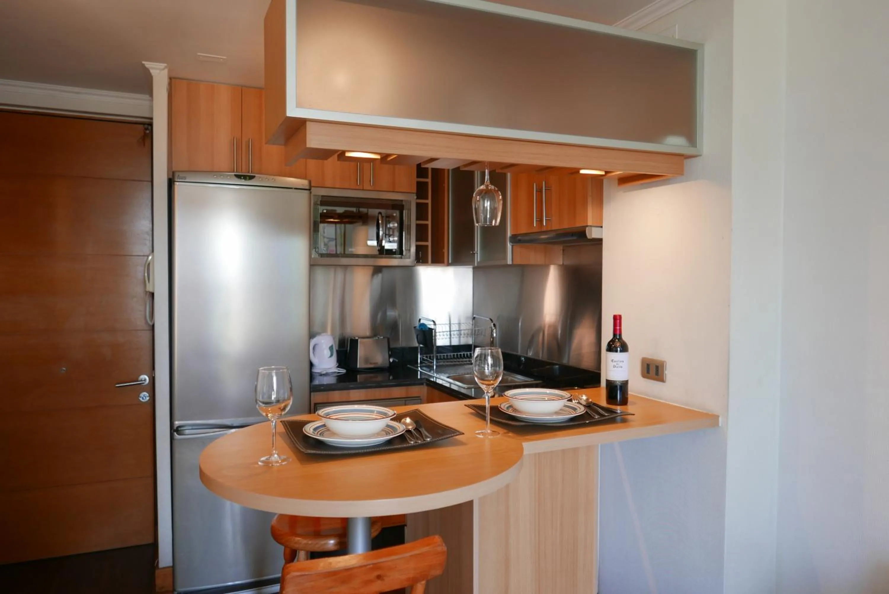 Kitchen or kitchenette in Apartamentos Cordova Savini