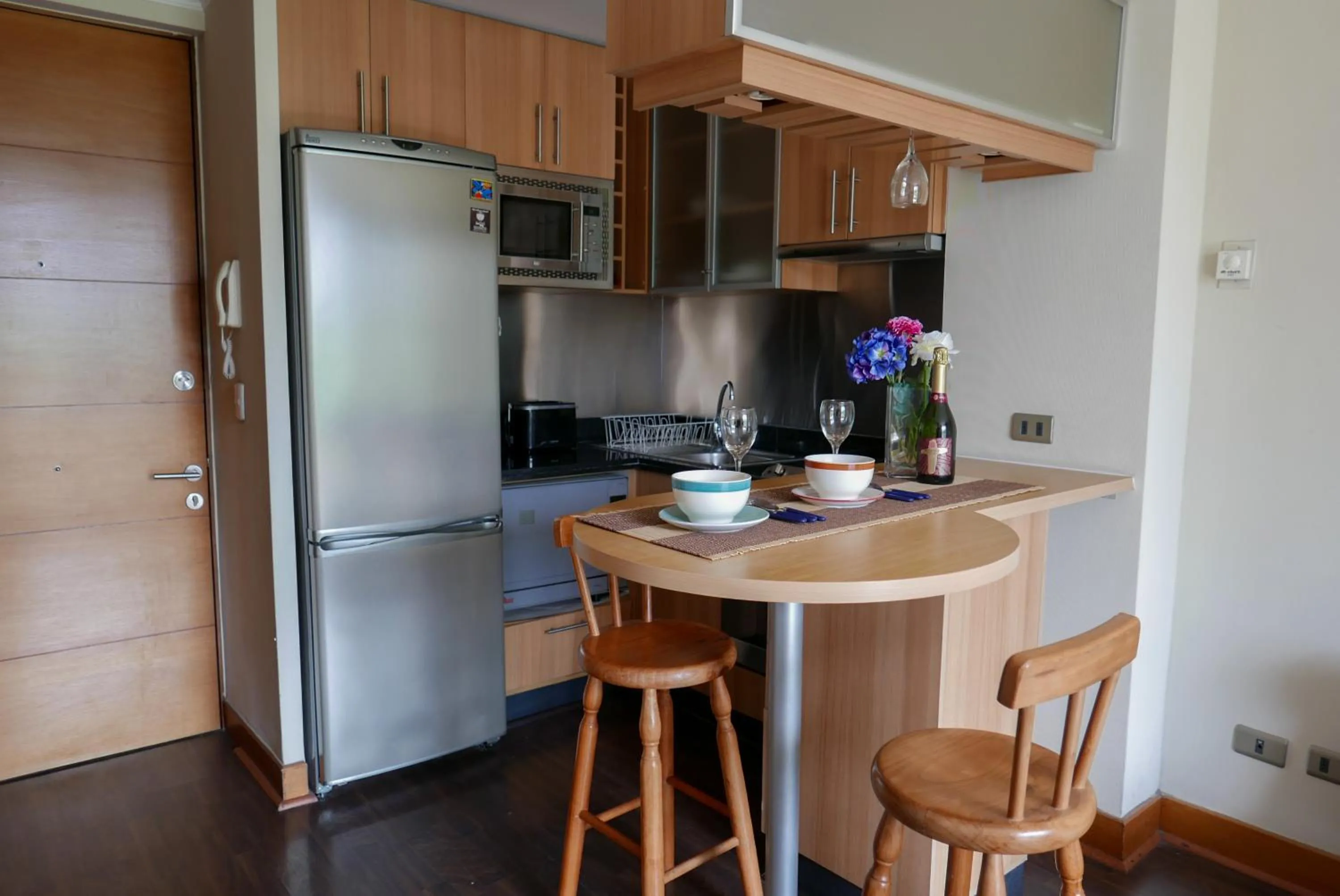 Kitchen or kitchenette in Apartamentos Cordova Savini