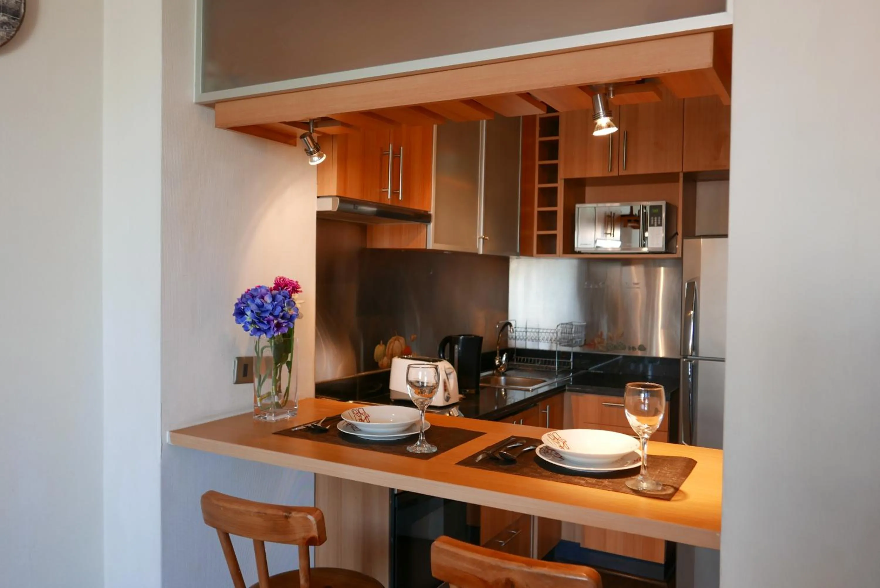 Kitchen or kitchenette in Apartamentos Cordova Savini