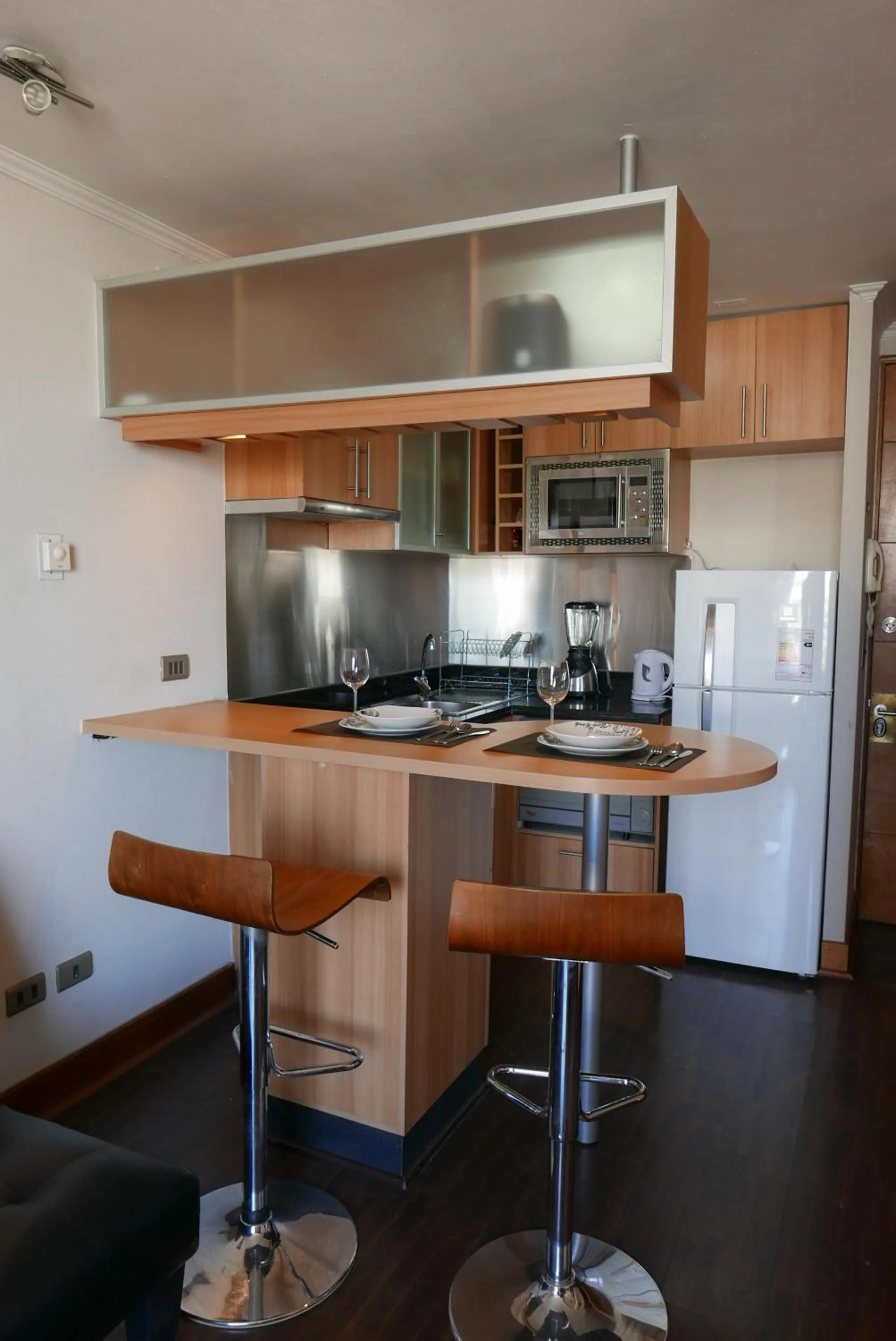 Kitchen or kitchenette in Apartamentos Cordova Savini