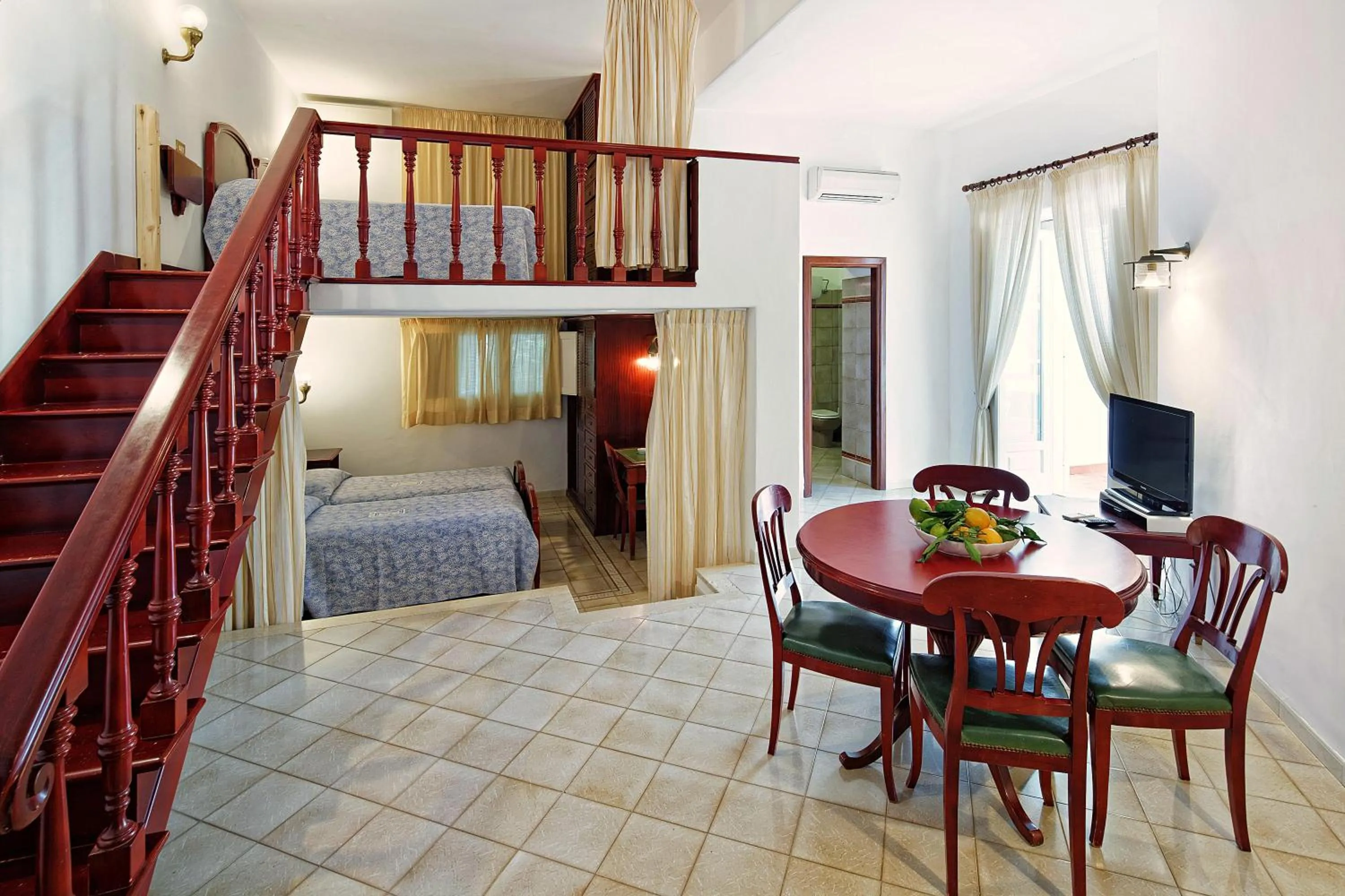 Dining area, Bed in Parco Smeraldo Appartamenti