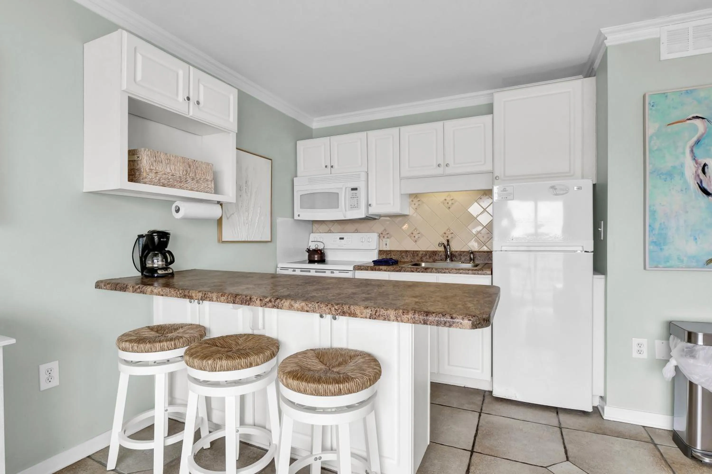 Kitchen or kitchenette in Sandpeddler Inn and Suites