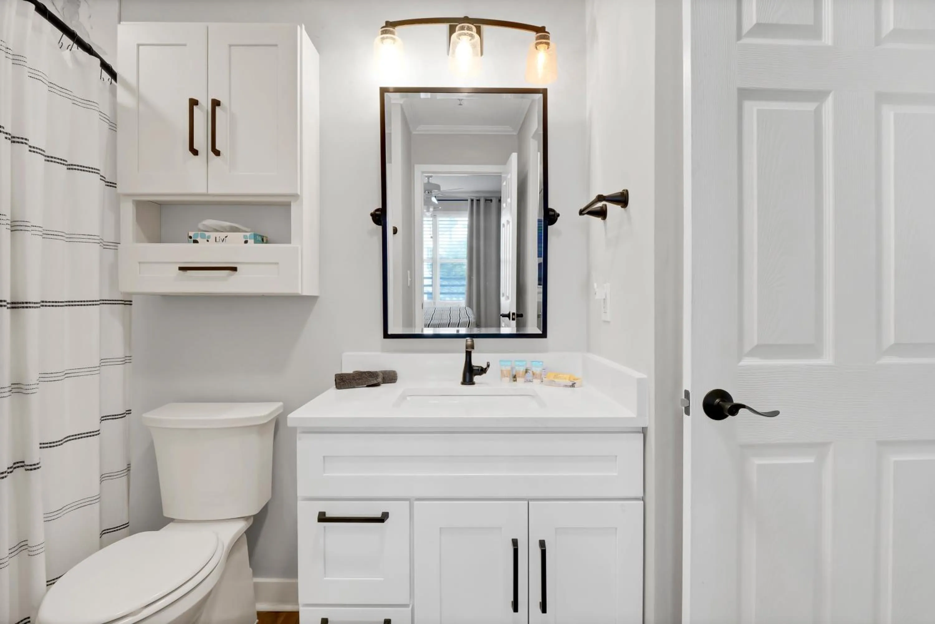 Toilet in Sandpeddler Inn and Suites