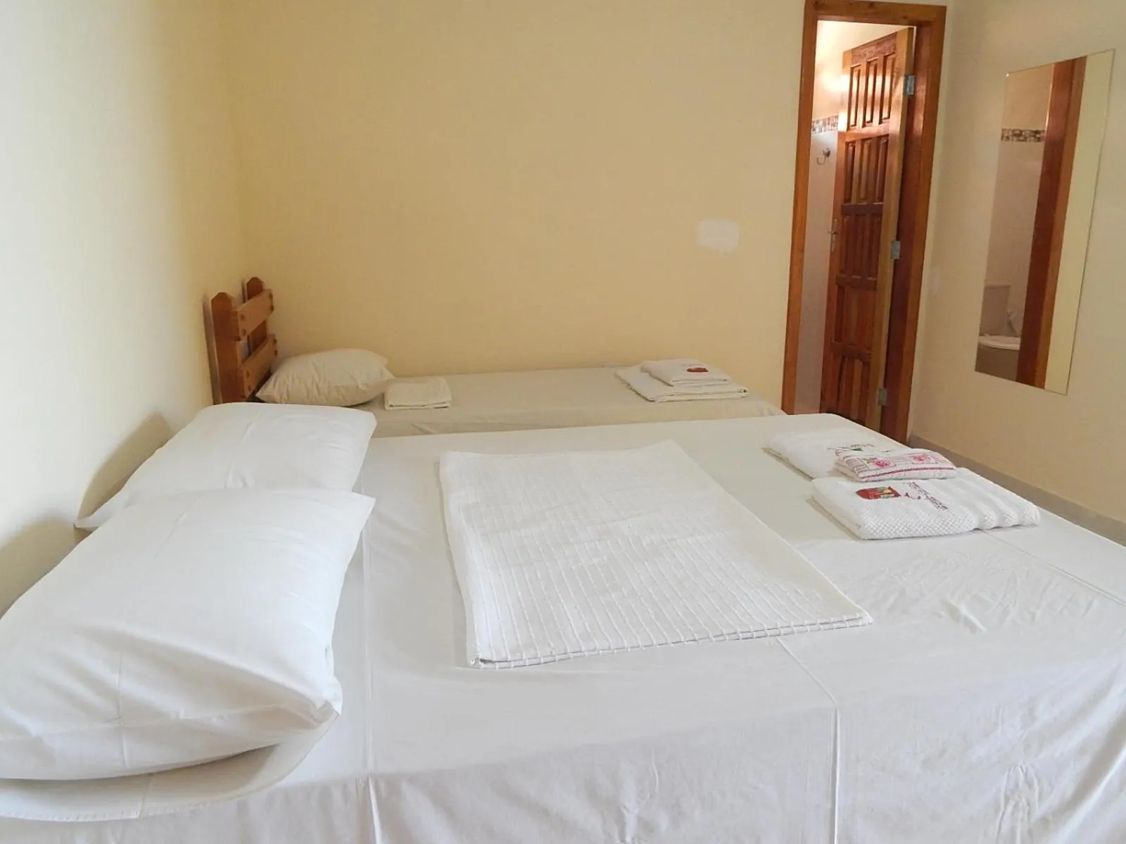 Bed in Pousada Maresias Guriri