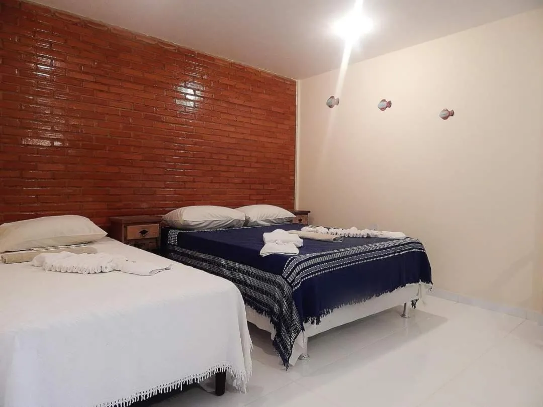 Bed in Pousada Maresias Guriri