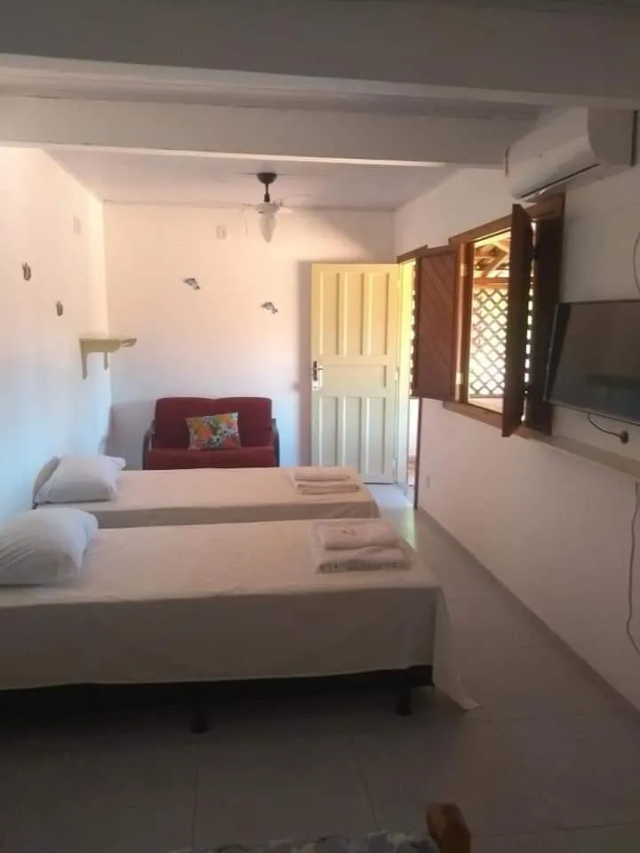 Bed in Pousada Maresias Guriri