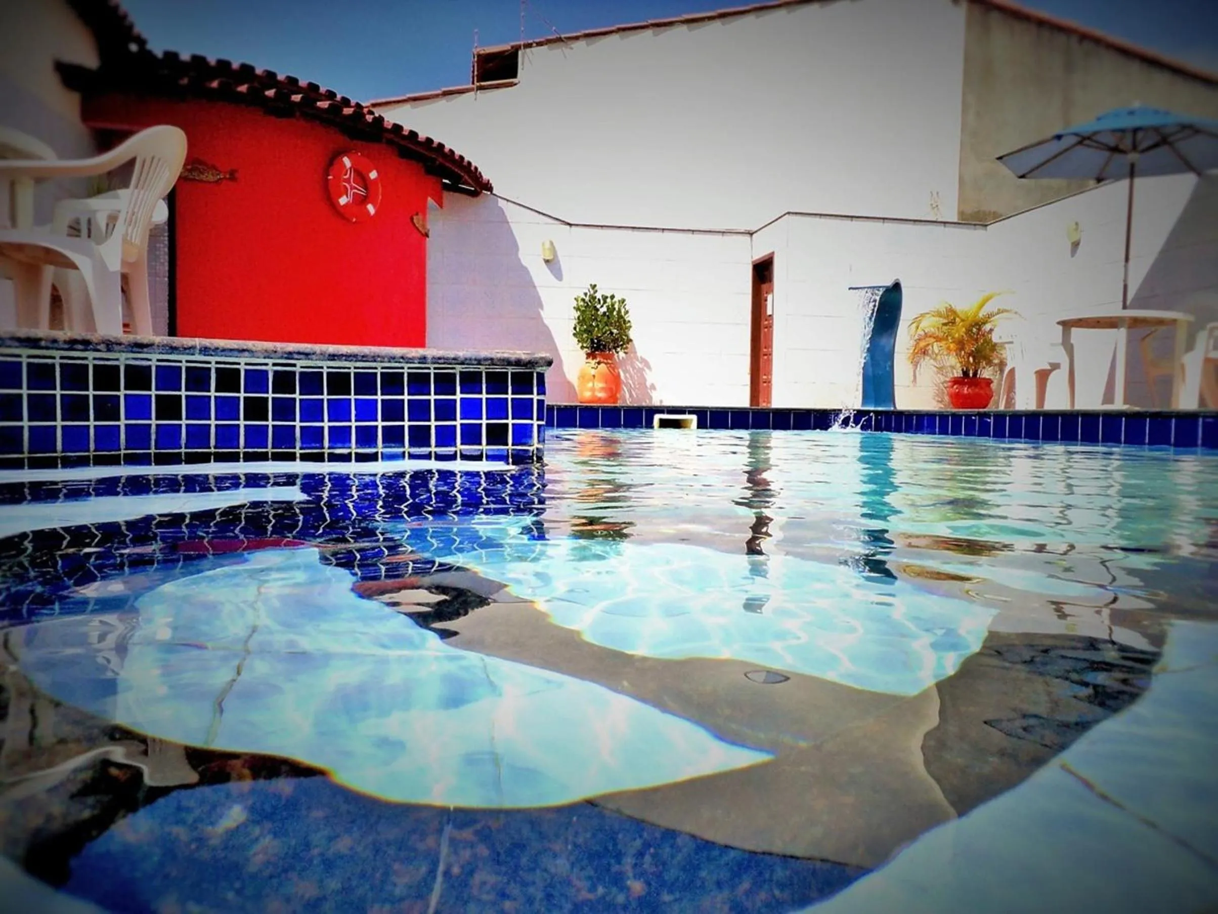 Swimming pool in Pousada Maresias Guriri