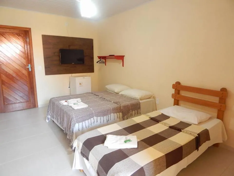 Bed in Pousada Maresias Guriri