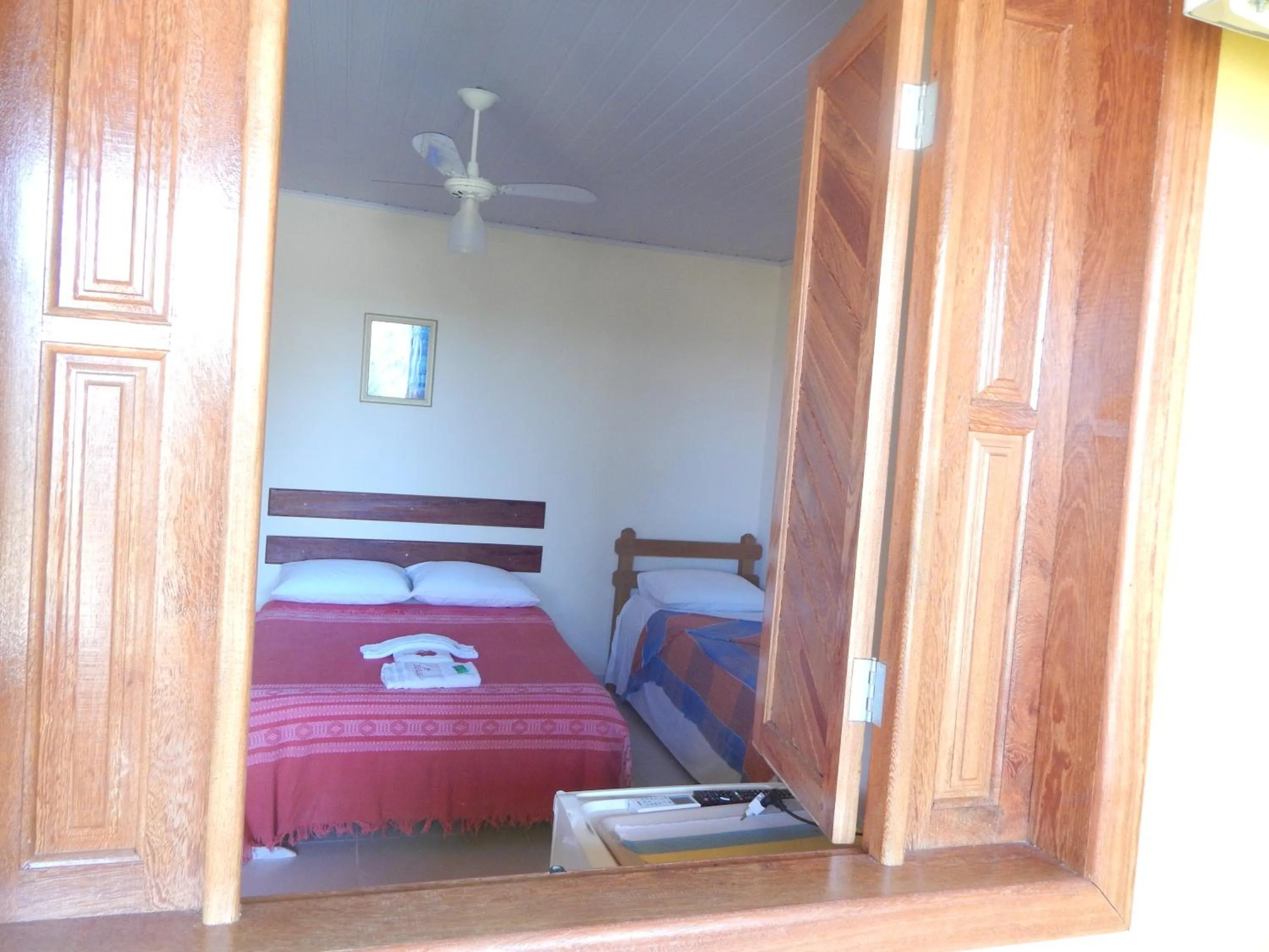 Bed in Pousada Maresias Guriri