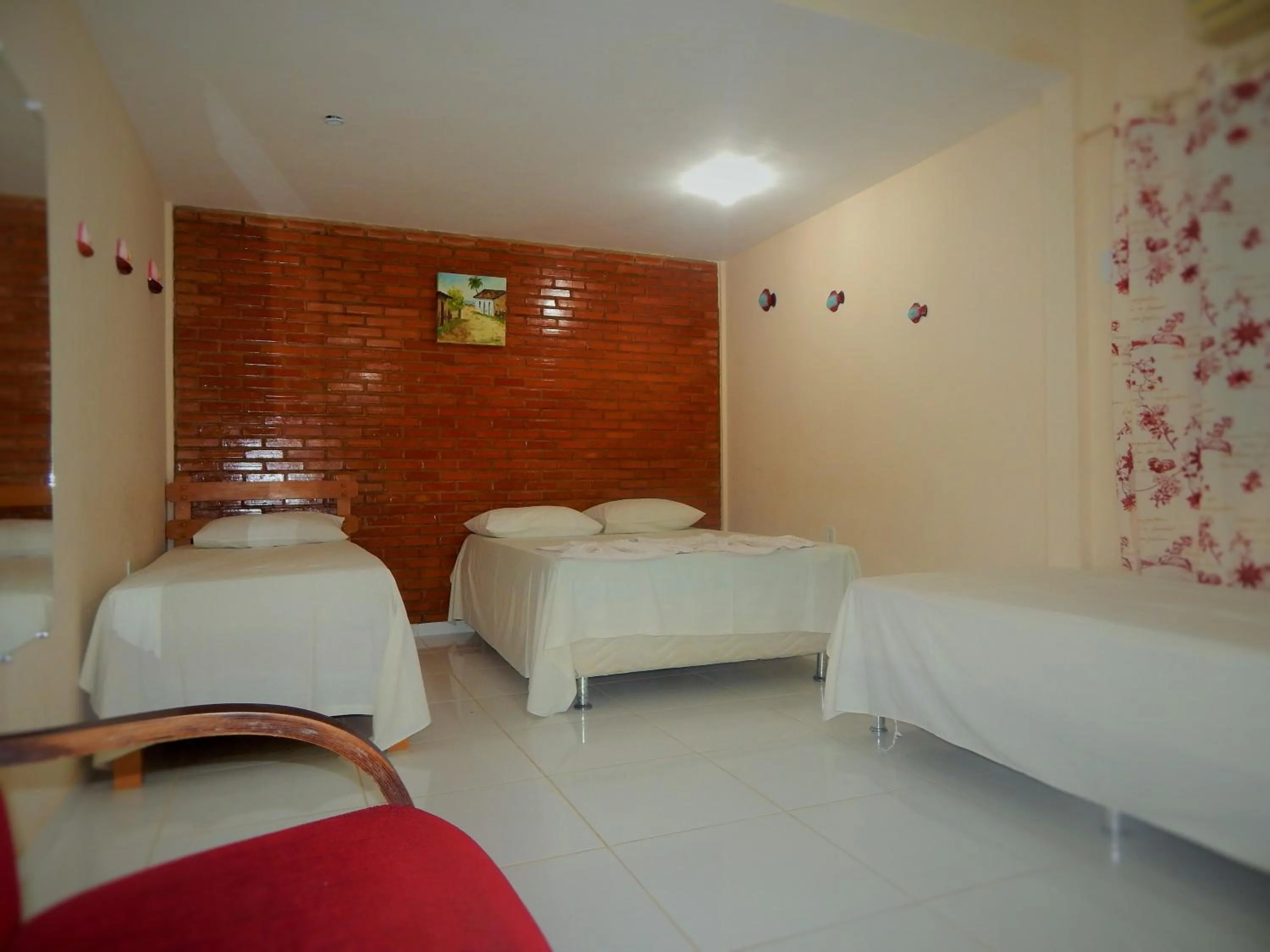 Bed in Pousada Maresias Guriri