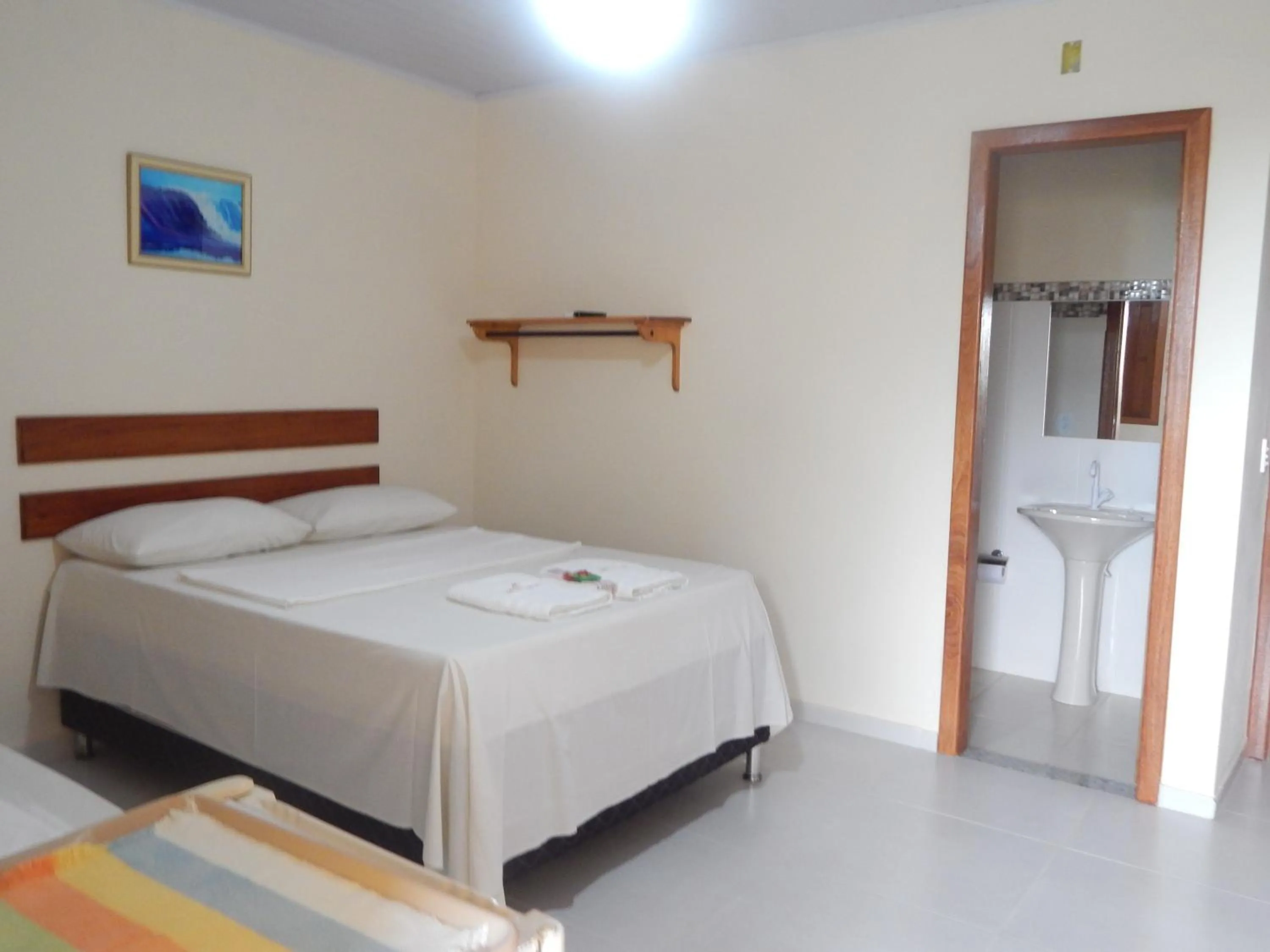 Bed in Pousada Maresias Guriri