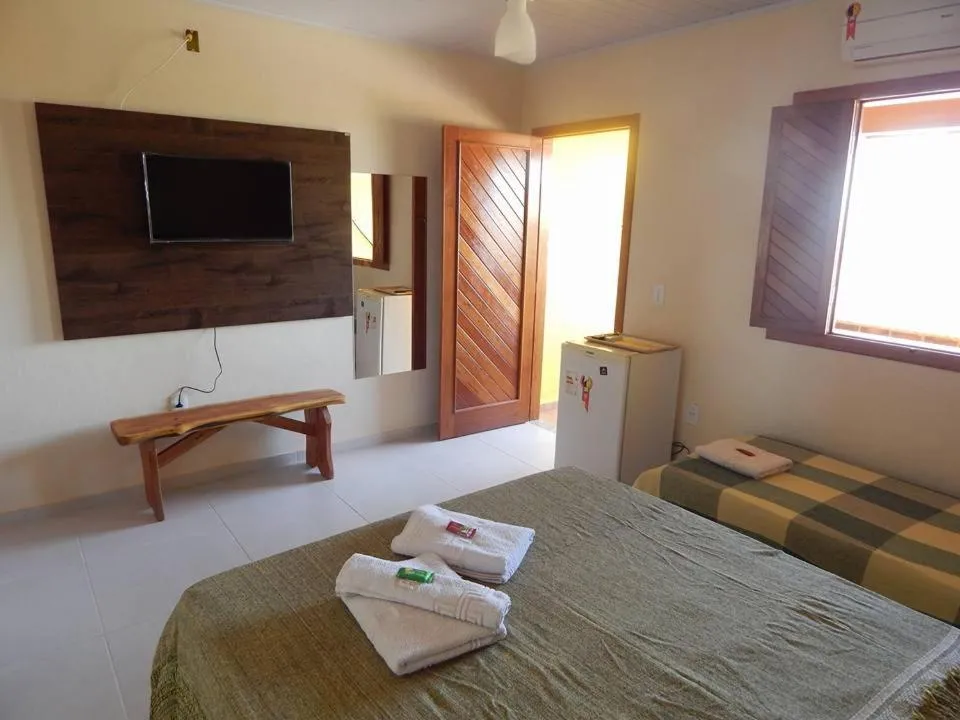 Bed in Pousada Maresias Guriri