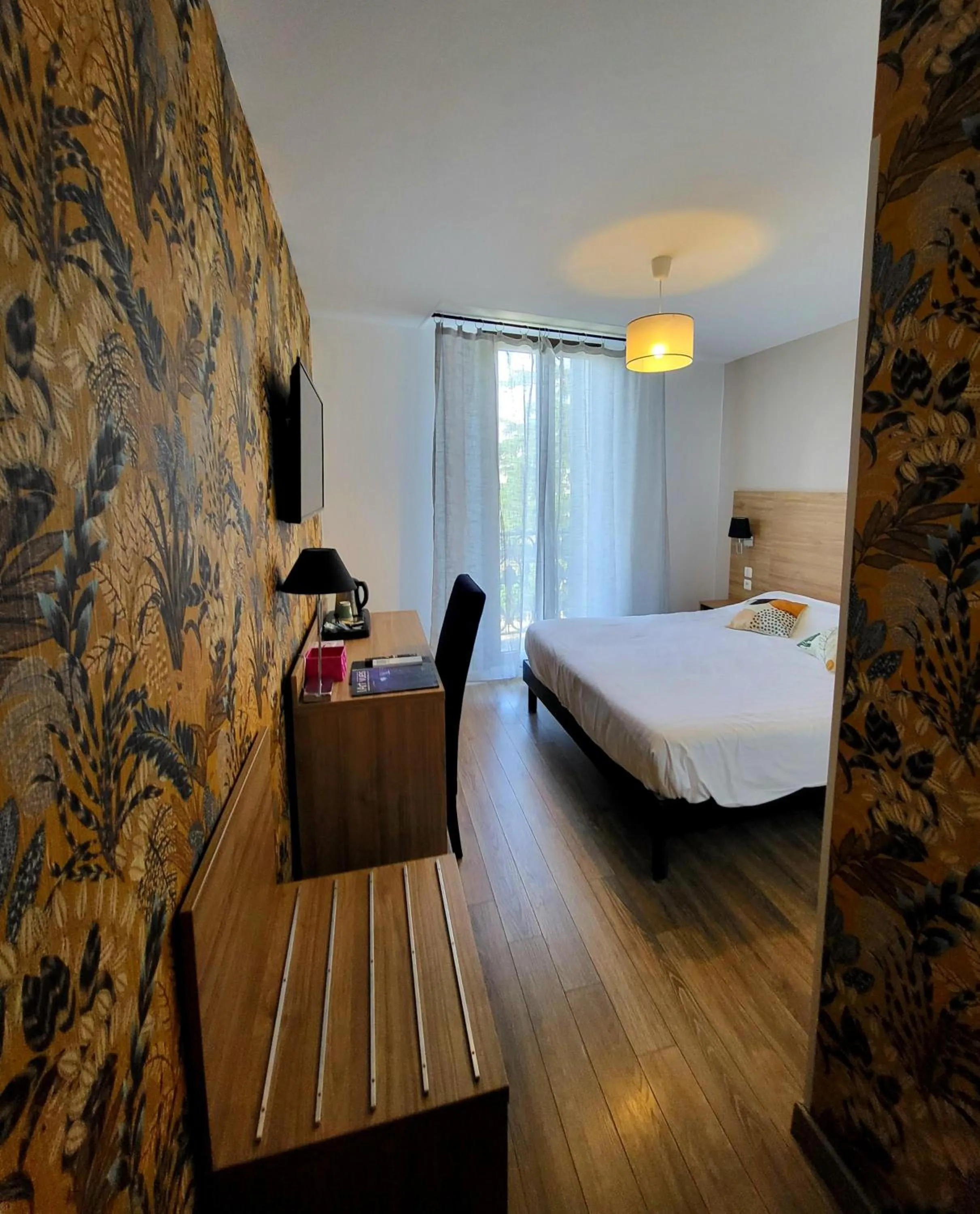 Bed in Le Grand Hôtel Molière