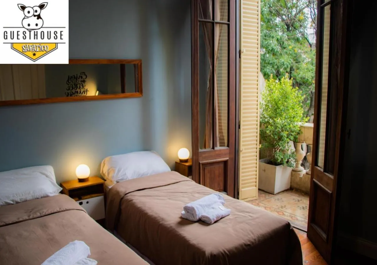 Photo of the whole room, Bed in Sabatico Travelers Hostel & Guesthouse