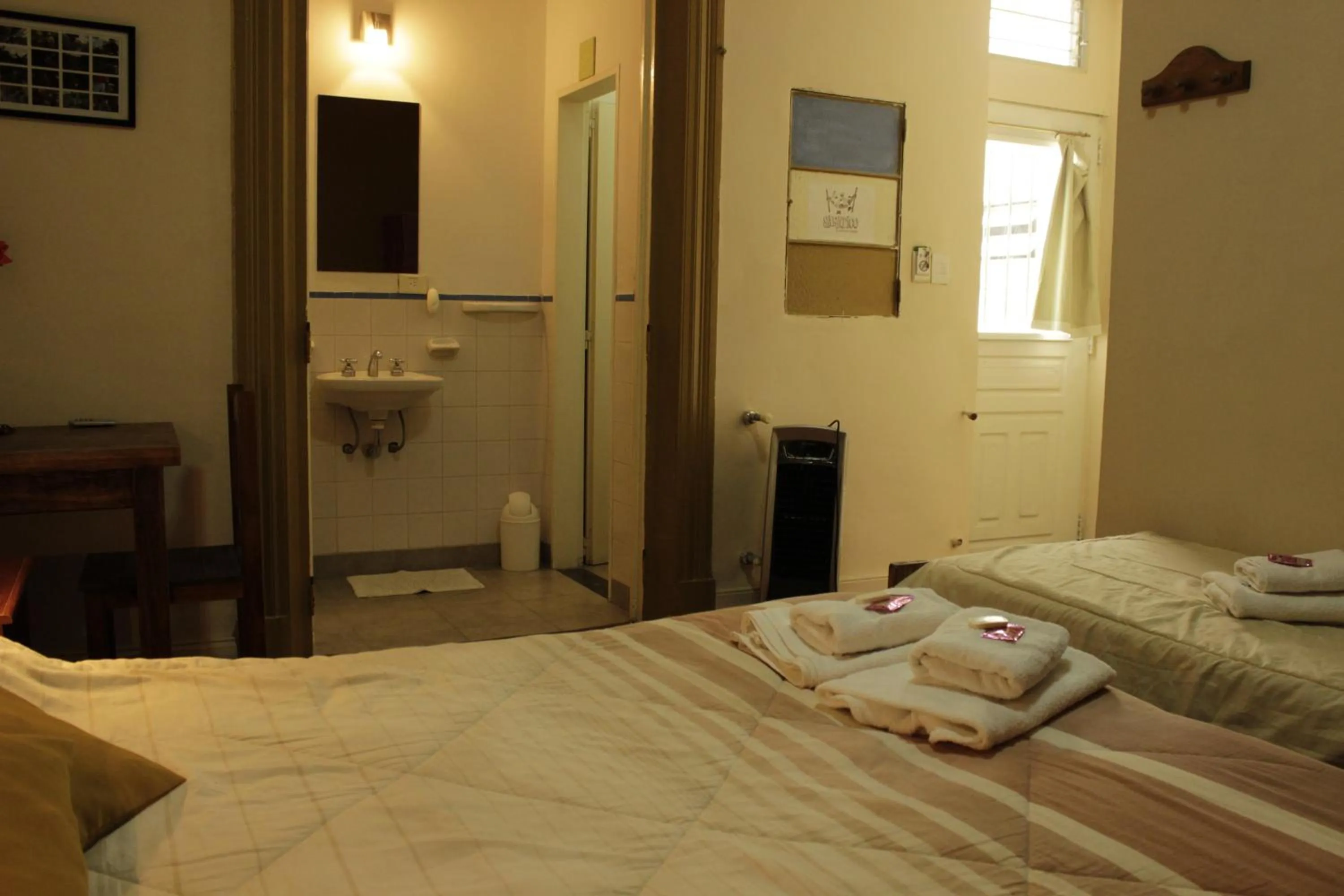 Bed in Sabatico Travelers Hostel & Guesthouse