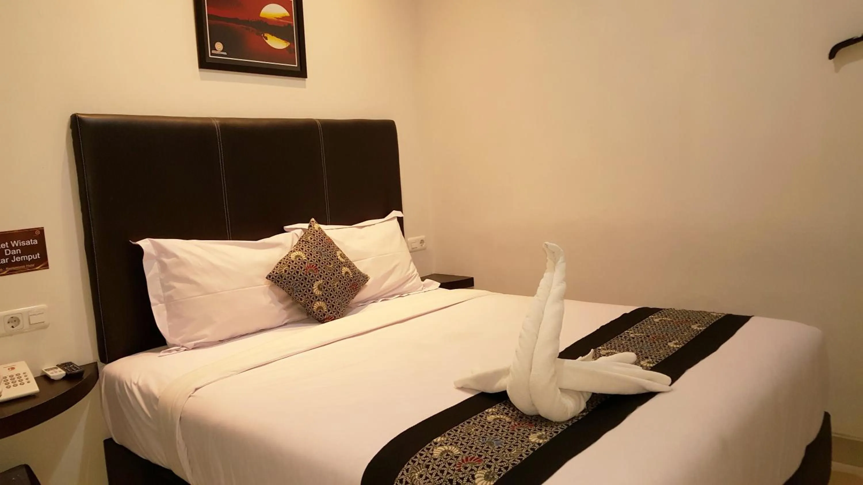 Bed in Sunrise Hotel Jombor Jogja