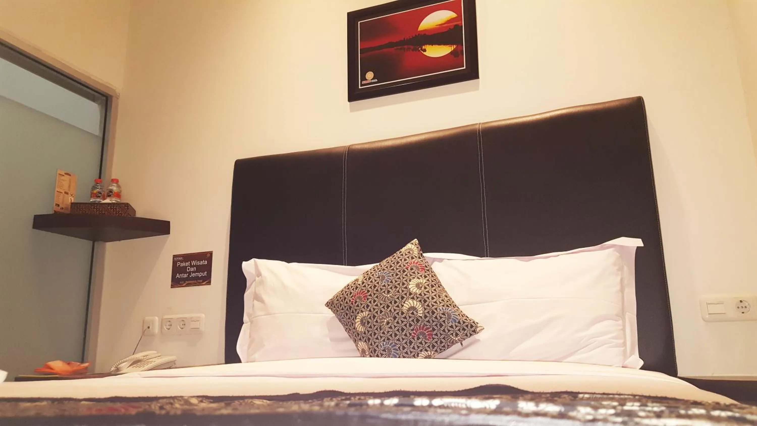 Bed in Sunrise Hotel Jombor Jogja