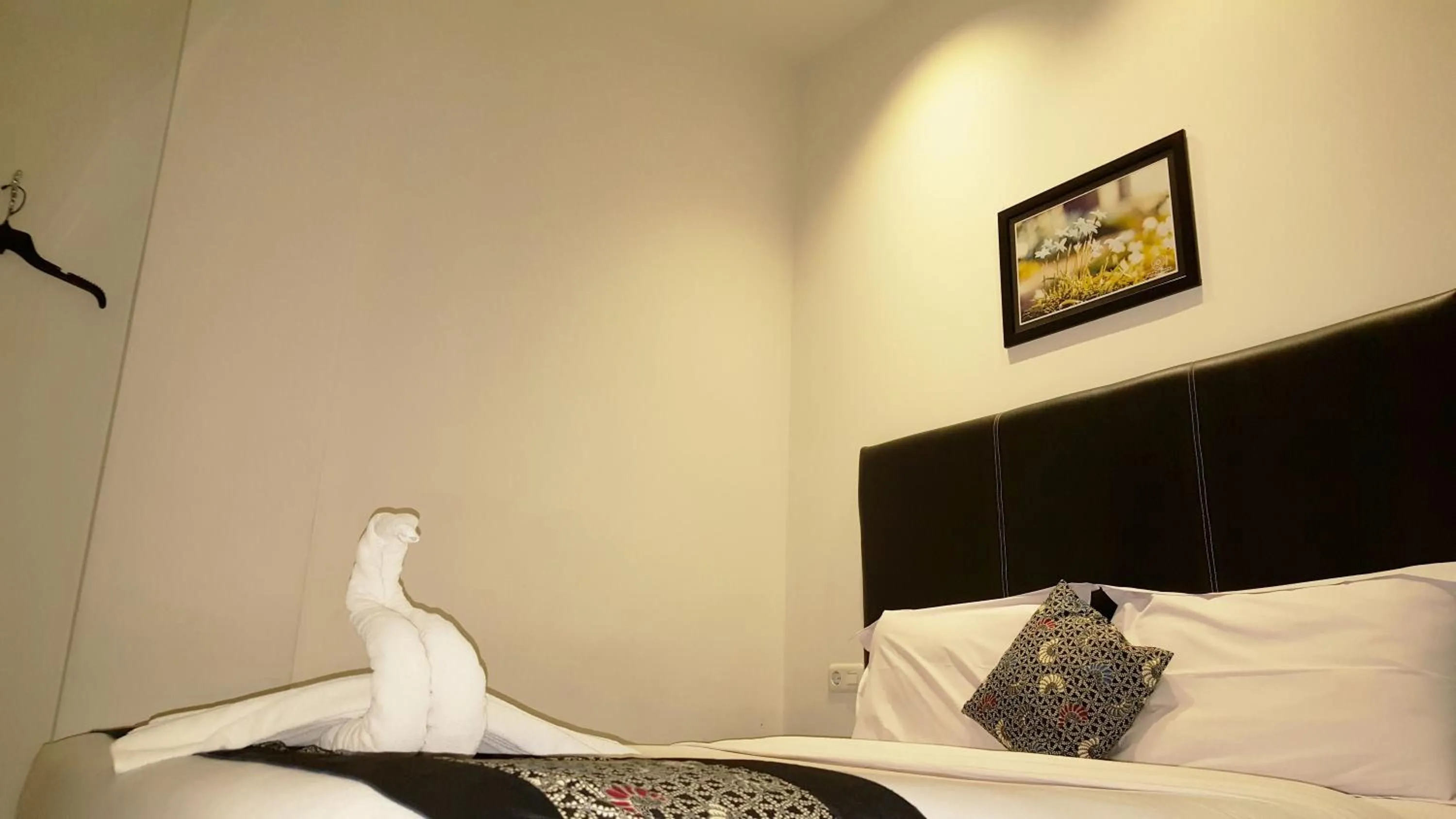 Bed in Sunrise Hotel Jombor Jogja