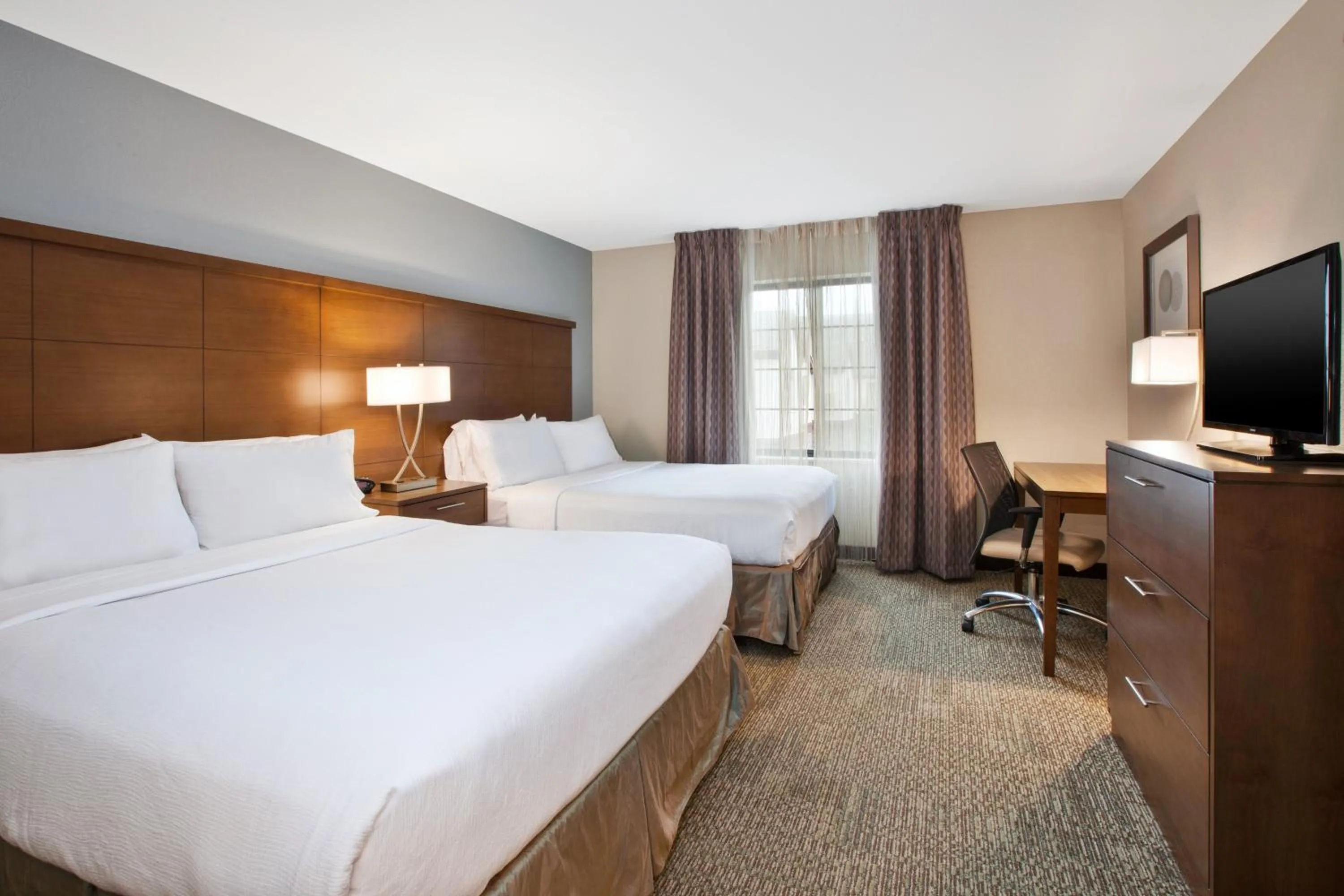 Photo of the whole room, Bed in Staybridge Suites Kalamazoo by IHG