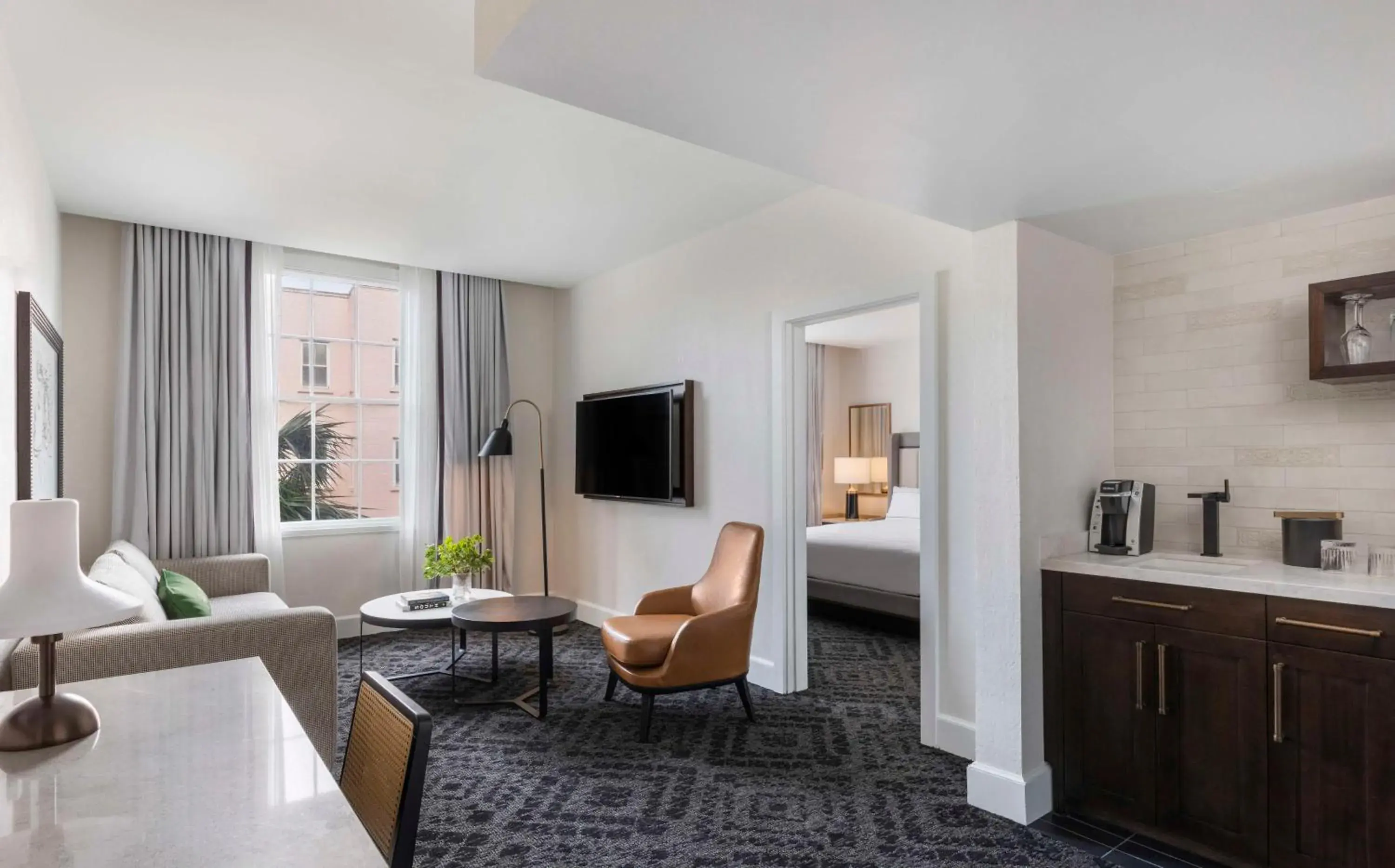 Living room in Mills House Charleston, Curio Collection by Hilton Living room in Mills House Charleston, Curio Collection by Hilton