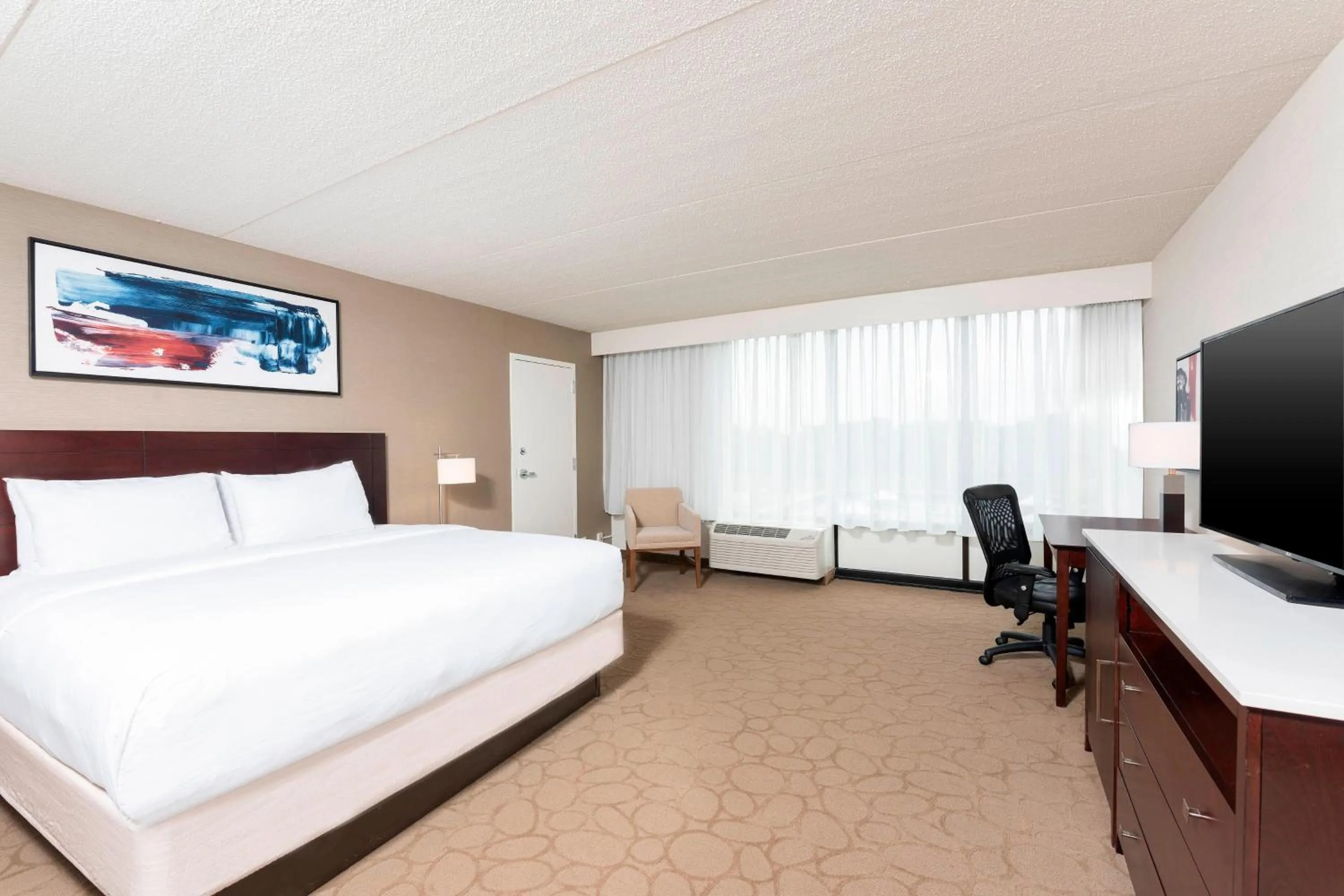 Photo of the whole room, Bed in Delta Hotels by Marriott Kalamazoo Conference Center