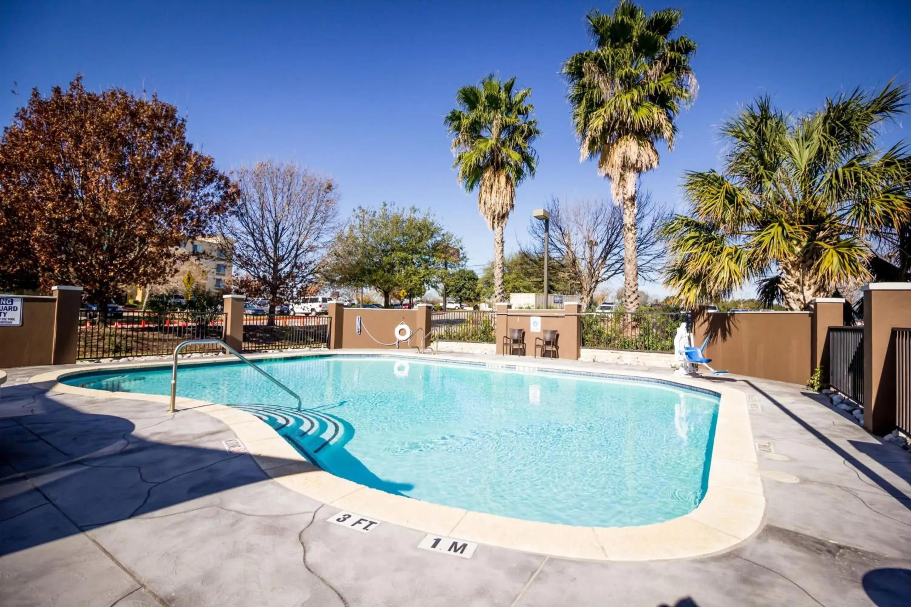 Swimming pool in Atwell Suites Austin Airport by IHG Swimming pool in Atwell Suites Austin Airport by IHG