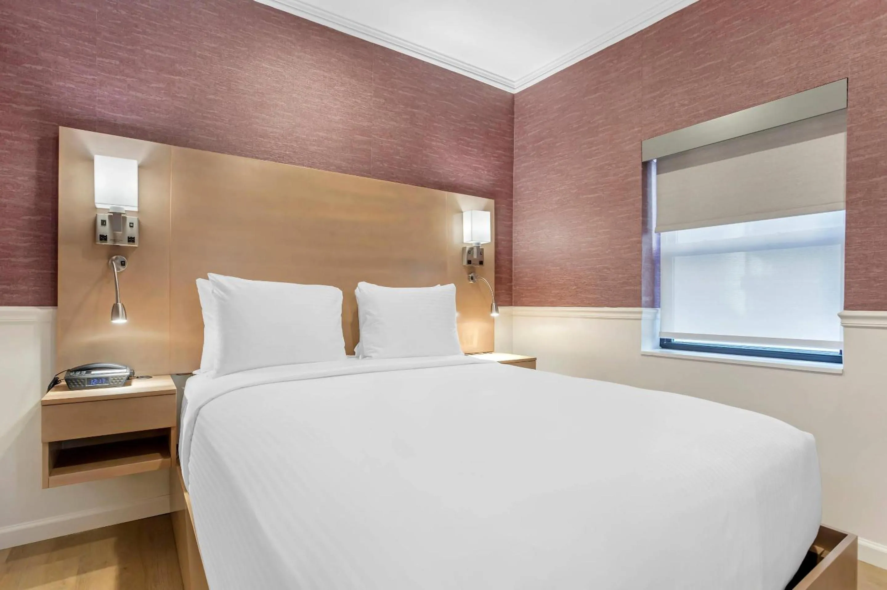 Bedroom, Bed in The Mayfair Hotel Times Square, an Ascend Collection