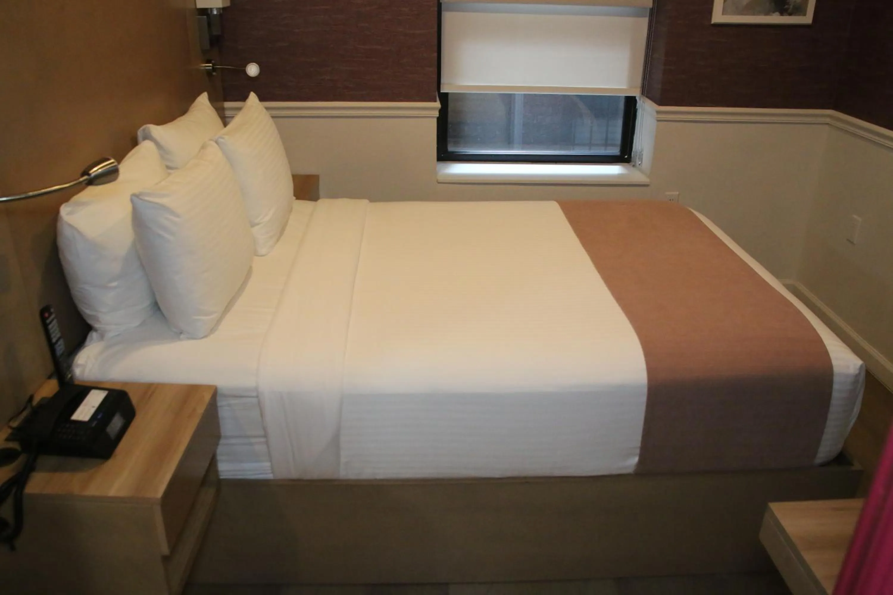 Bed in The Mayfair Hotel Times Square, Ascend Hotel Collection