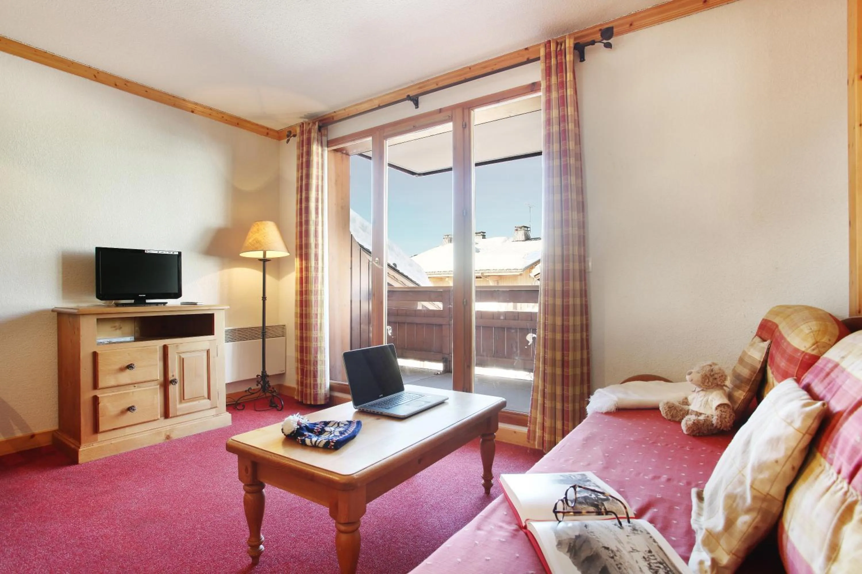 Seating area, Bed in Résidence Odalys Le Village