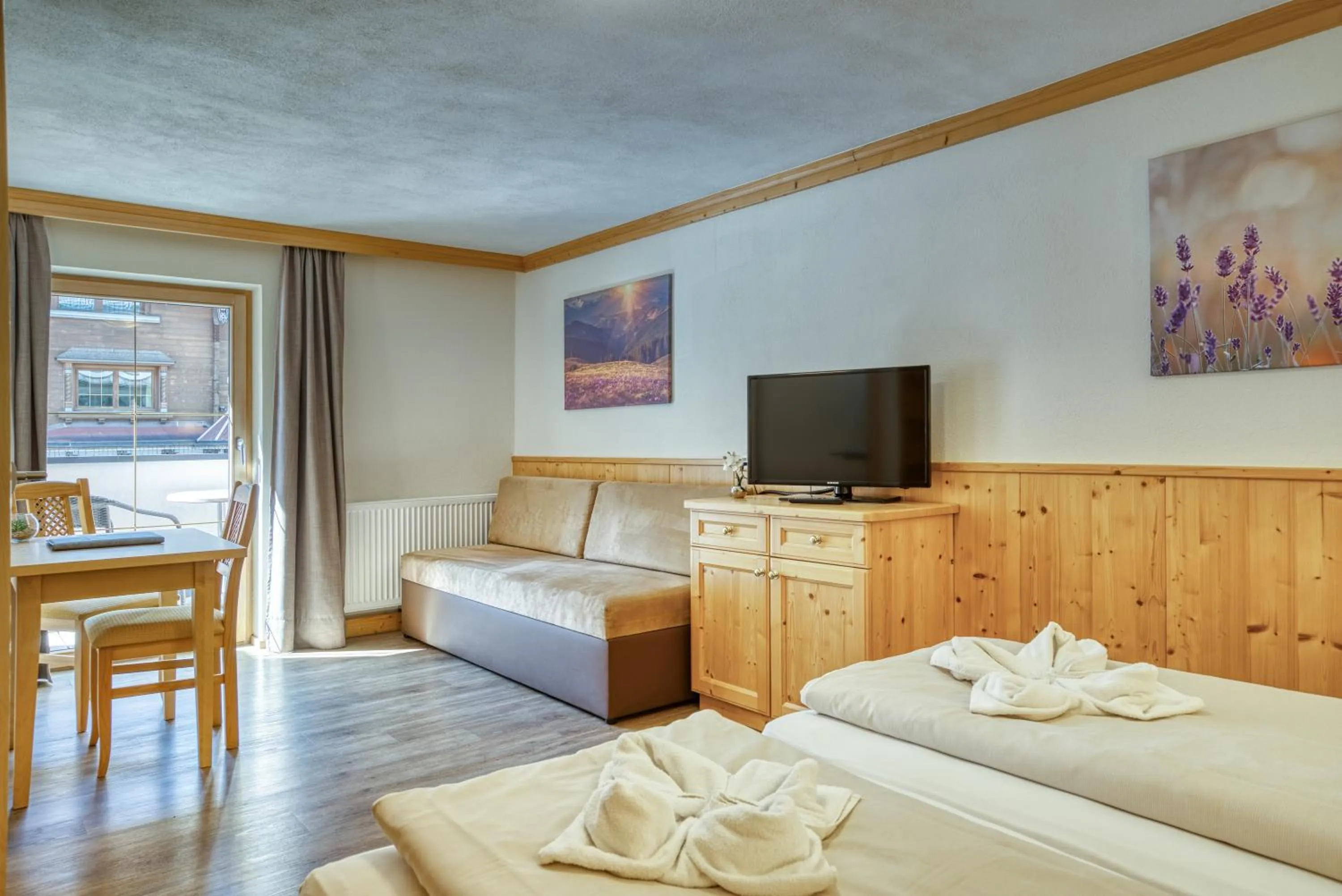 Photo of the whole room, Bed in SonnenHOF hotel gerlos centrum