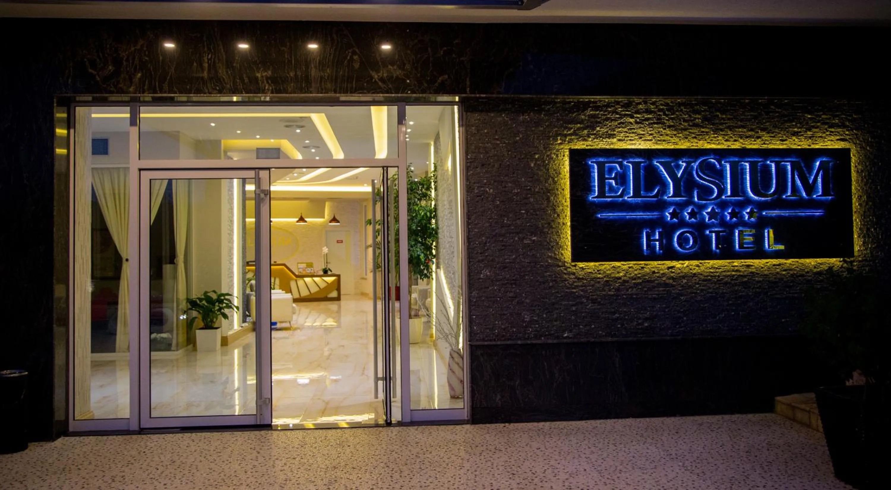 Property logo or sign in Elysium Hotel