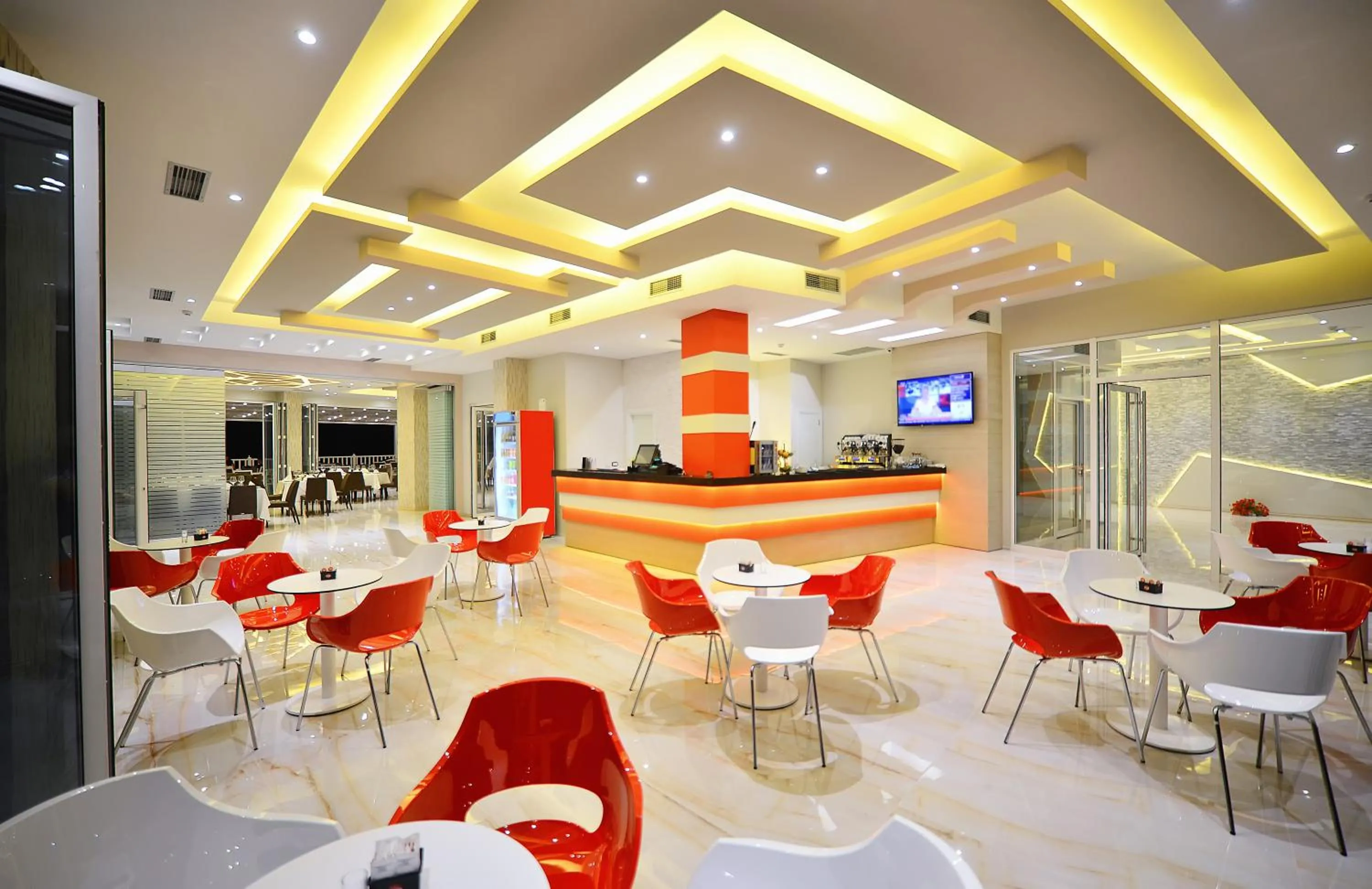 Communal lounge/ TV room in Elysium Hotel