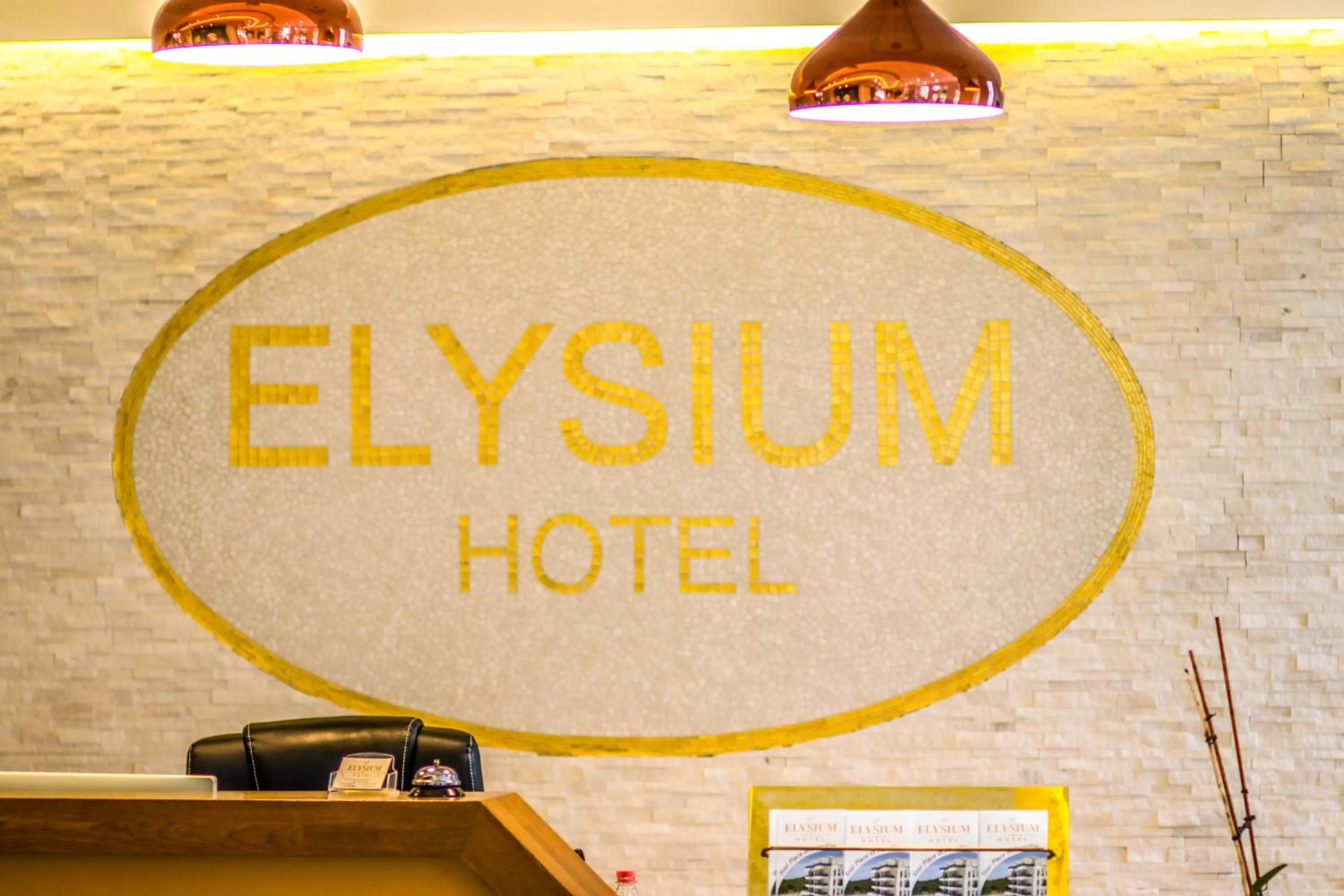 Property logo or sign in Elysium Hotel